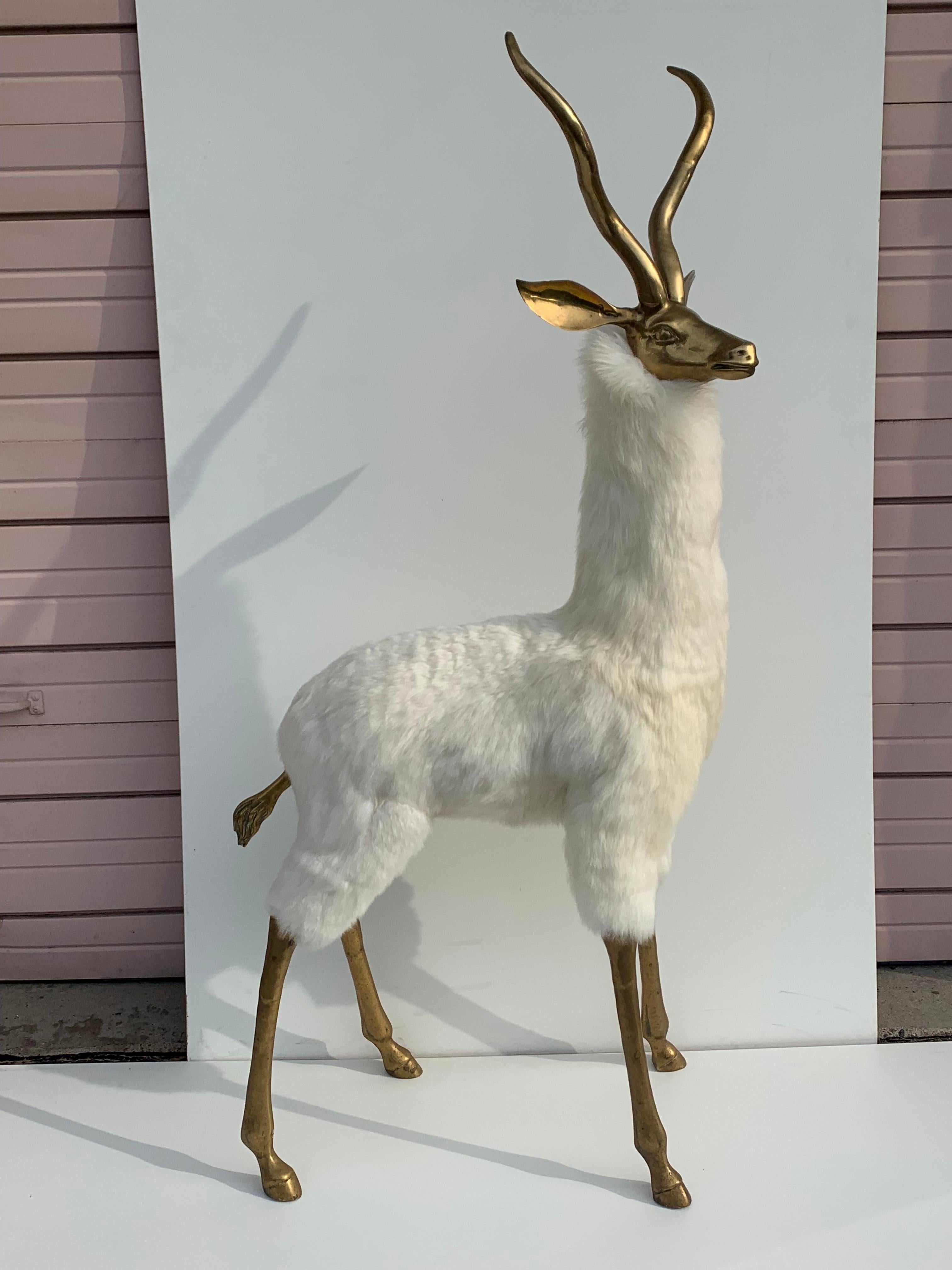 Brass gazelle or antelope sculpture recovered in real sheep fur in the style of Lalanne.
   
