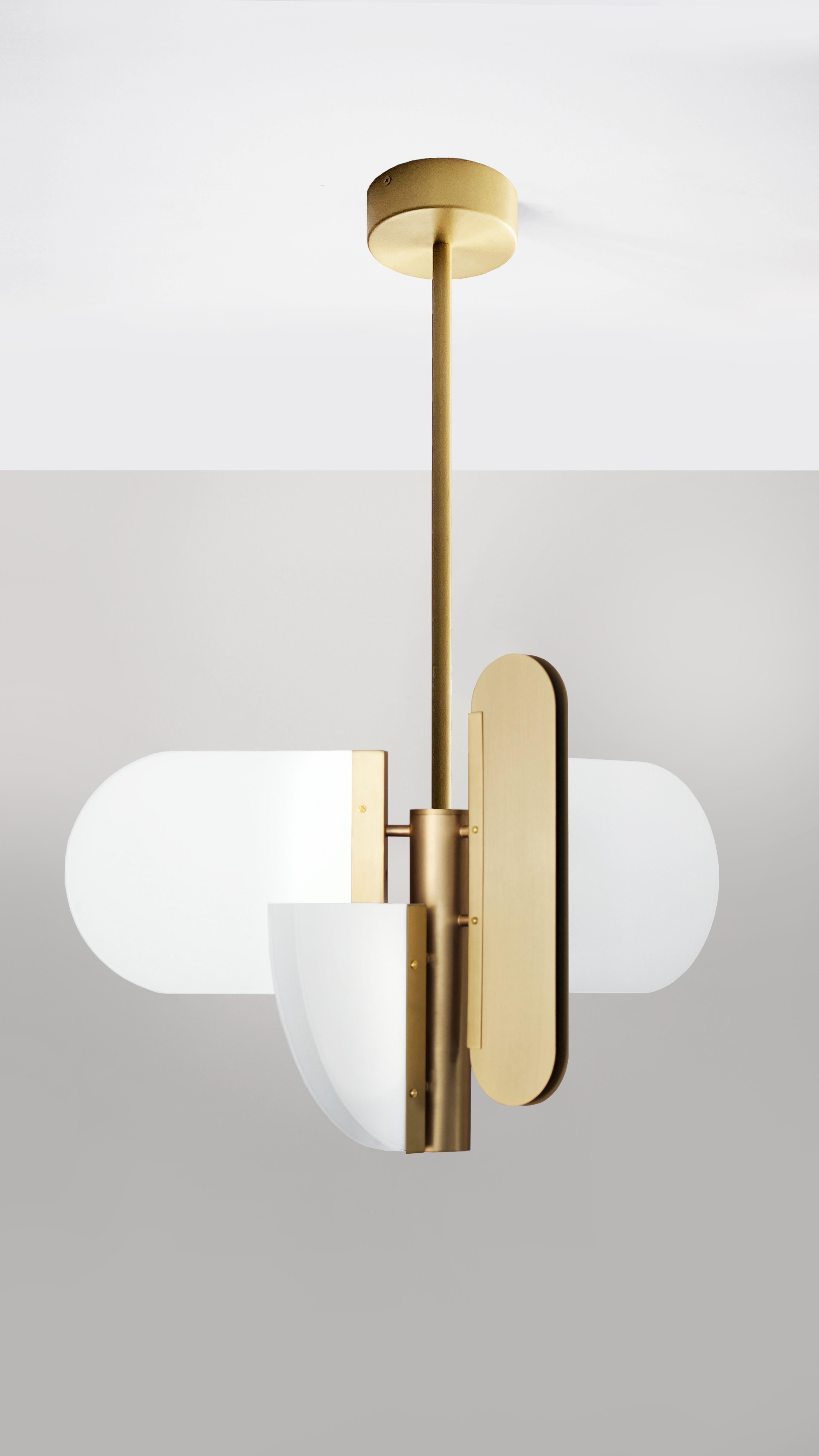 Brass Geometric Task Pendant Lamp by Square in Circle
Dimensions: W 42.5 x H 70 x D 38 cm
Materials: Brushed brass finish, white frosted glass

A play on geometry. Random geometric shapes were rotated horizontally and vertically, then joined