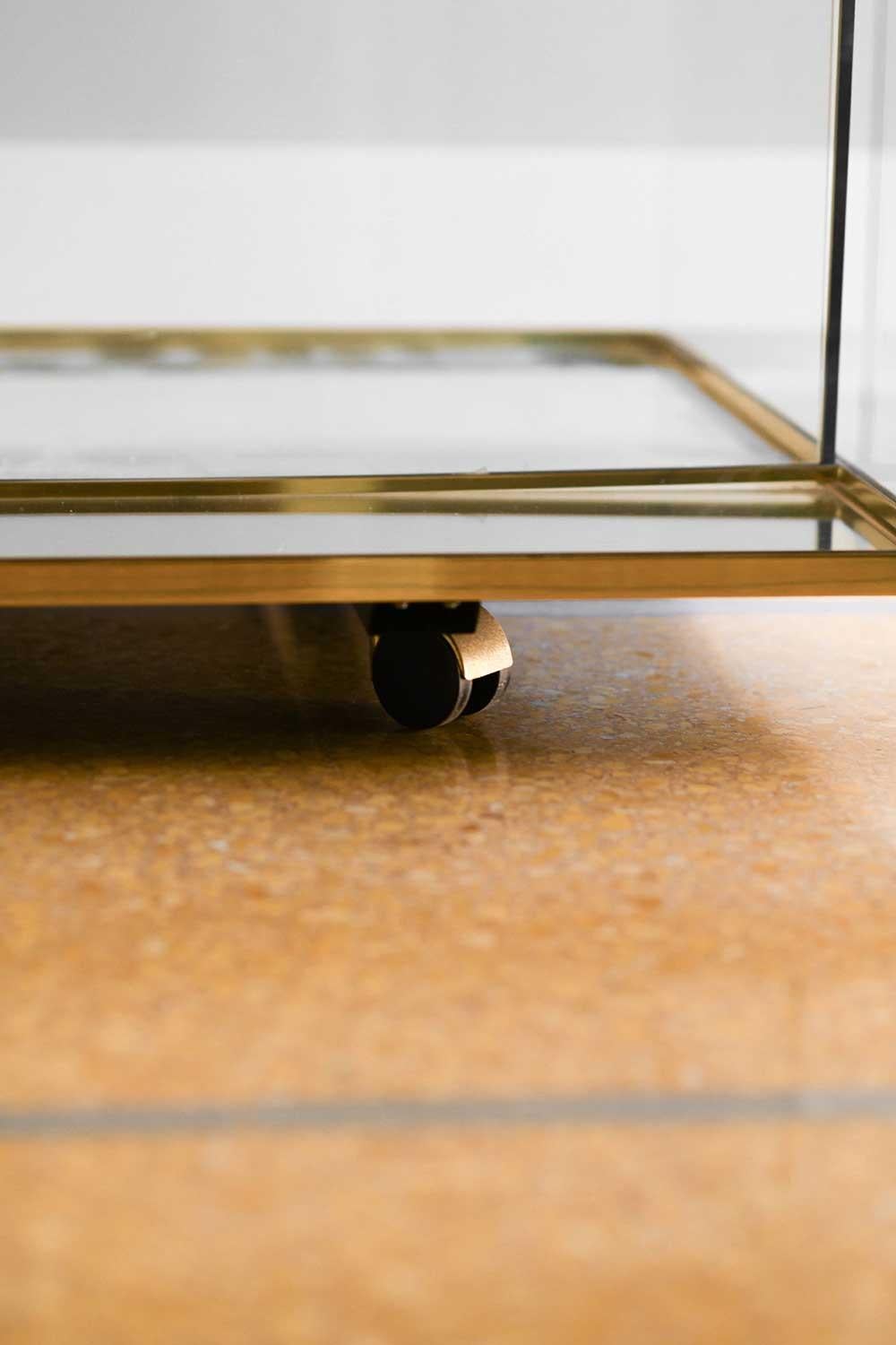 Brass, glass and mirrored glass coffee table with 4 removable trays, 1970
Product details
Dimensions: 136L x 38H x 78D cm