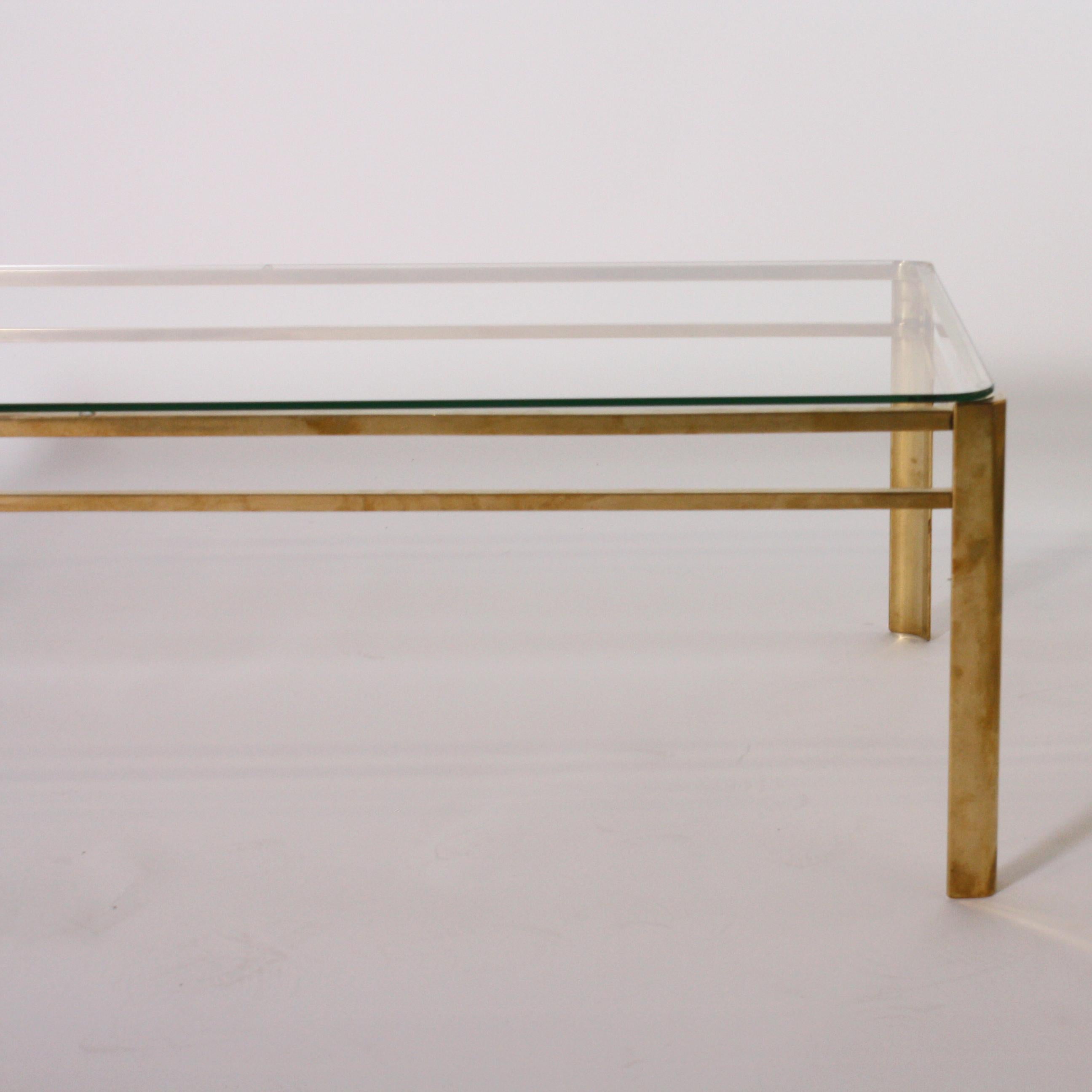 Brass & glass coffee table by Jacques Quinet, circa1960.