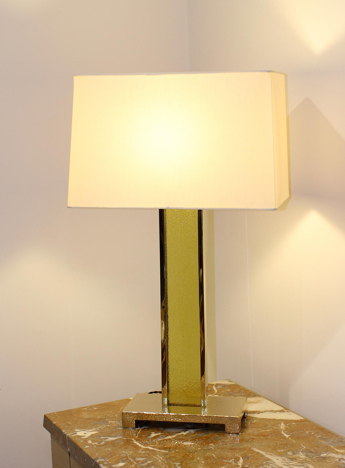 Philip Neri
Model PM2

Brass and Glass Table Lamps, Set of 3
Unique, from a special order.
Beautiful set of three tall table lamps. The base is in hammered solid cast bronze, the body is in polished brass, framing an authentic 17