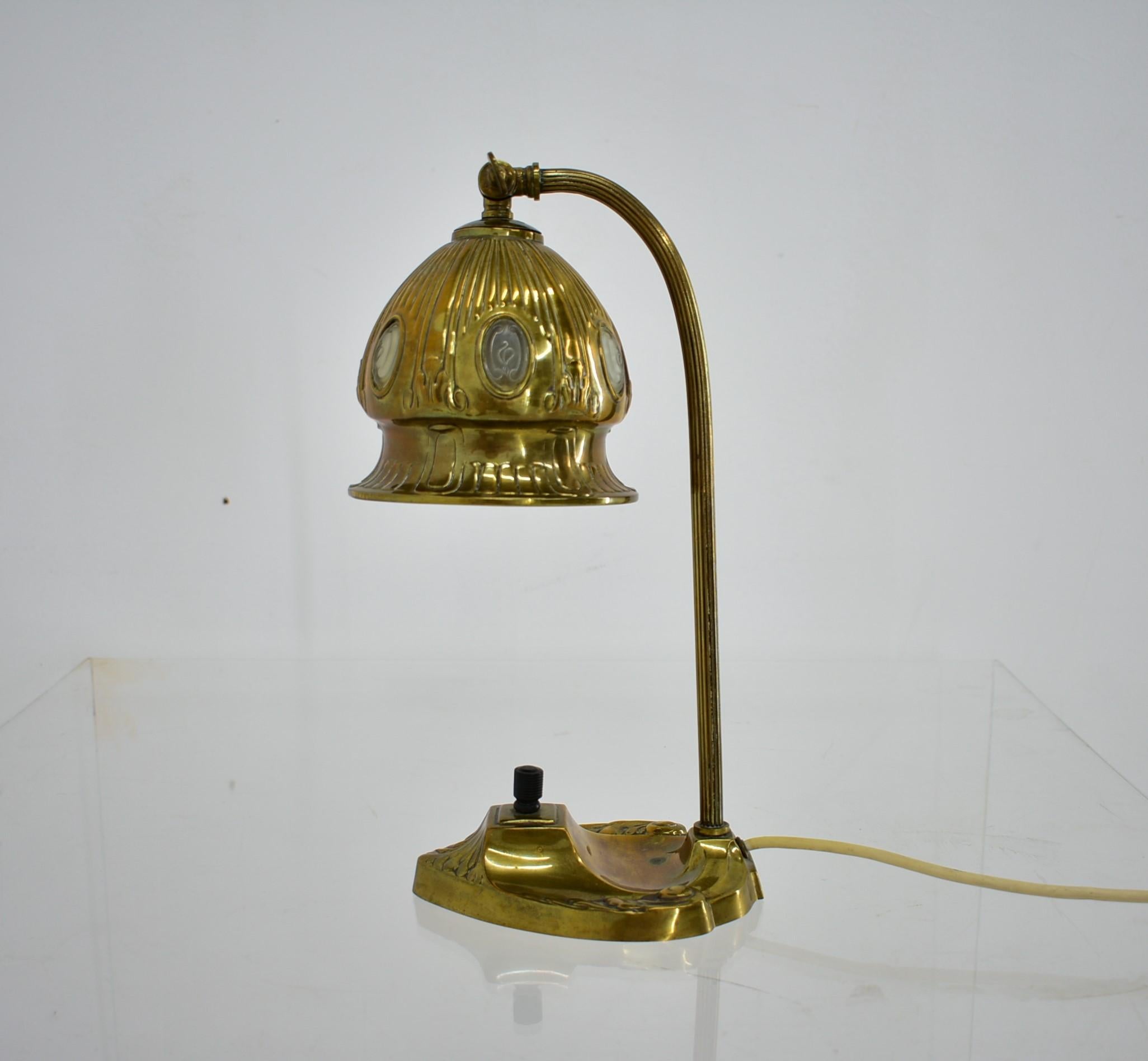 Brass glass vintage table lamp style Vienna Secession, which was made 1930s, Austria.
The brass construction shows beautiful brass patina.