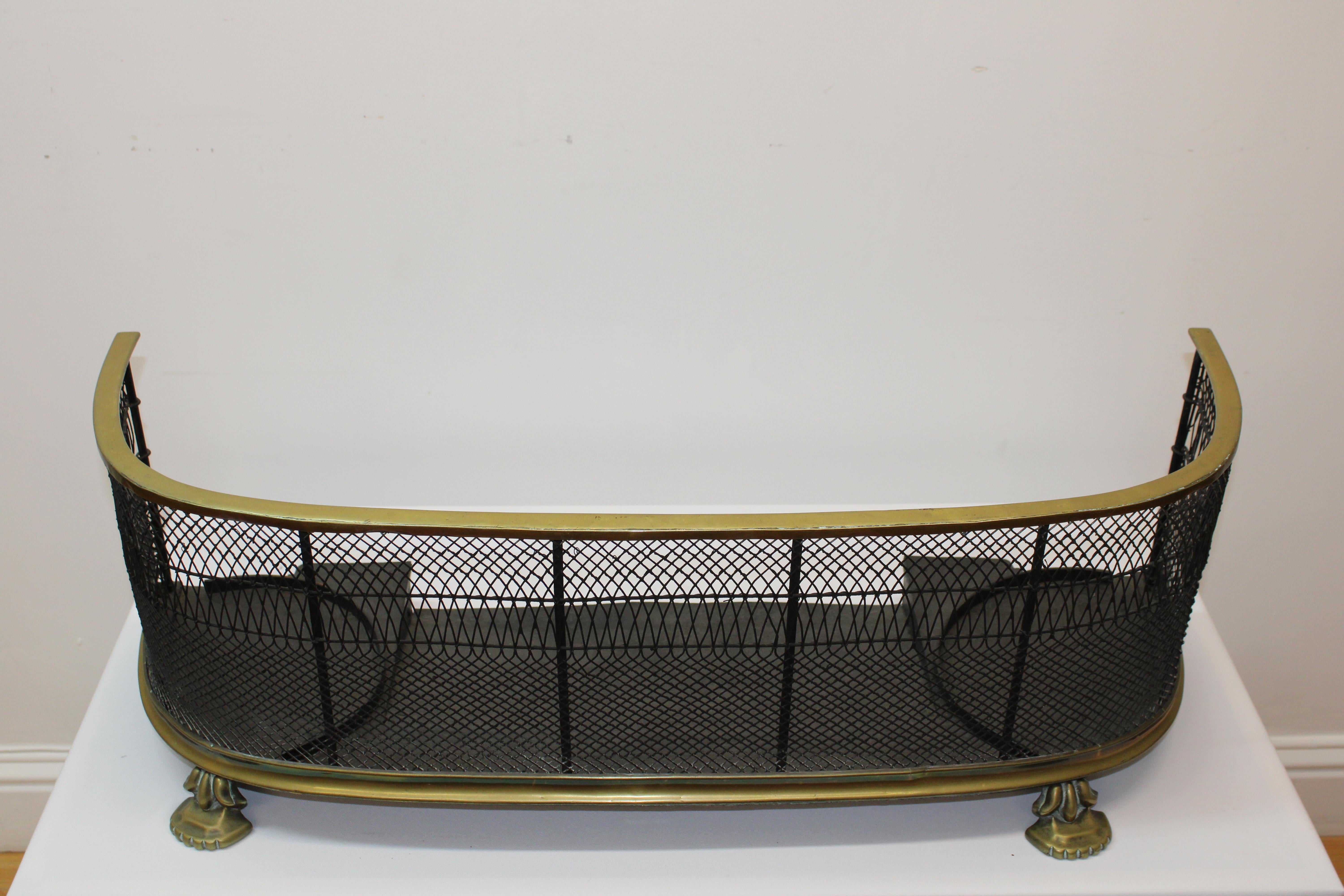 C. 19th century

Brass grate style fireplace Fender.