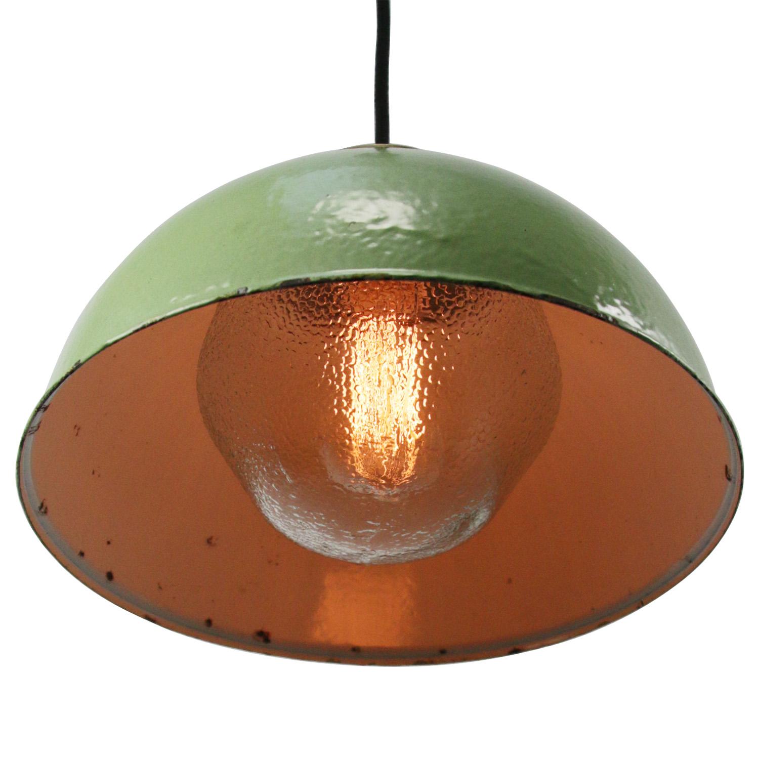 Green enamel Industrial hanging lamp.
Frosted glass with brass top.

Weight: 2.35 kg / 5.2 lb

Priced per individual item. All lamps have been made suitable by international standards for incandescent light bulbs, energy-efficient and LED bulbs.
