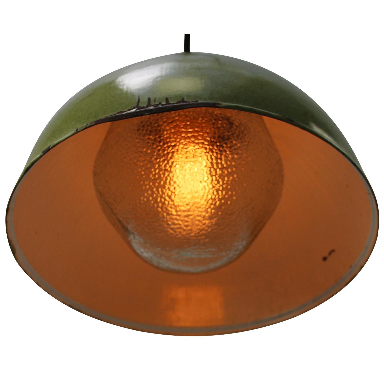 Green enamel Industrial hanging lamp.
Frosted glass with brass top.

Weight: 2.35 kg / 5.2 lb

Priced per individual item. All lamps have been made suitable by international standards for incandescent light bulbs, energy-efficient and LED bulbs.