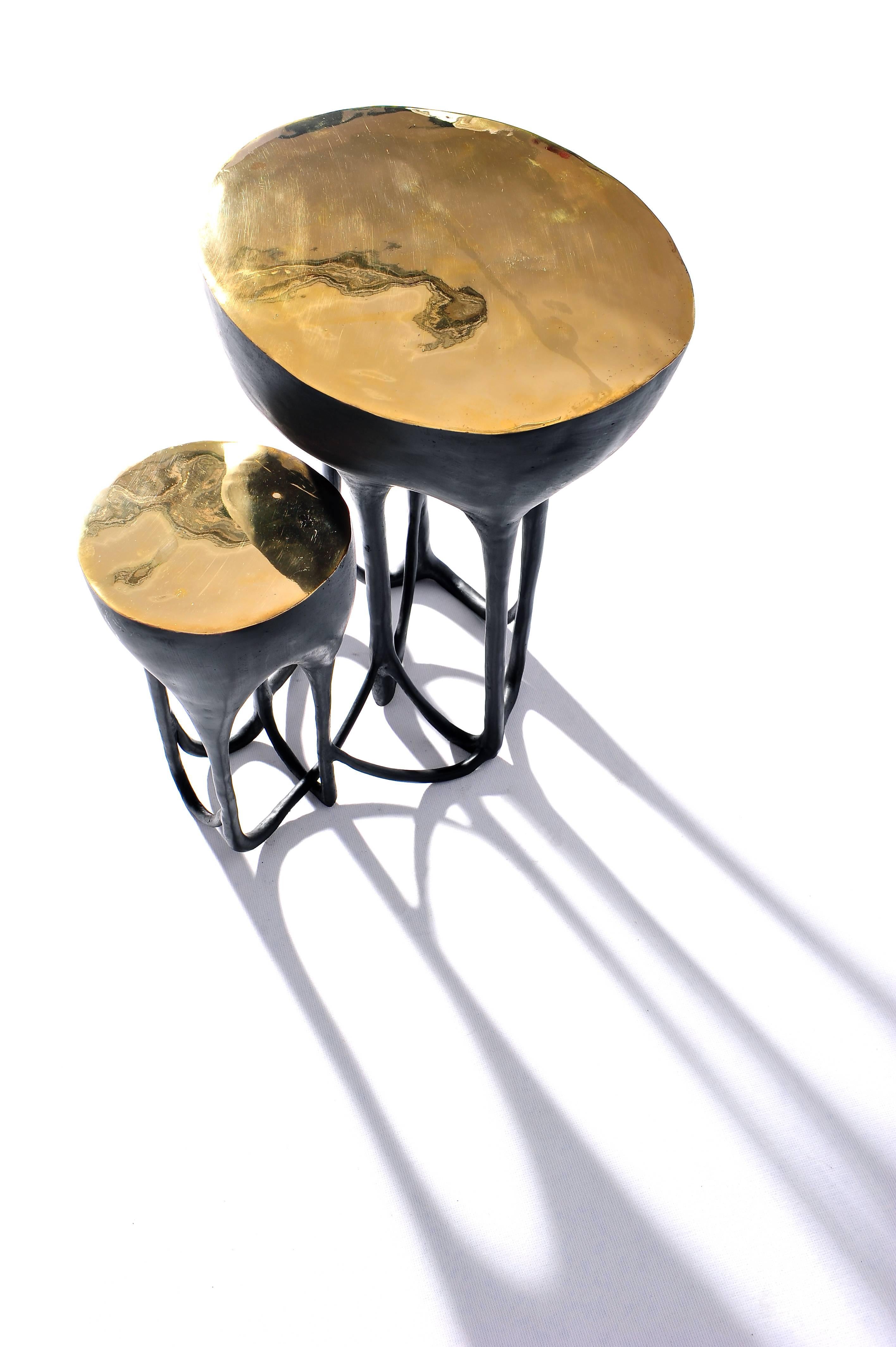 Brass hand-sculpted side table by Misaya.
Brass hand-sculpted side table.
Dimensions: H 50 x W 43 x L 50 cm.
MASAYA is our brand's collection which combines stylishly refined designs with the purity of solid wood & marble tops and bronze bases.