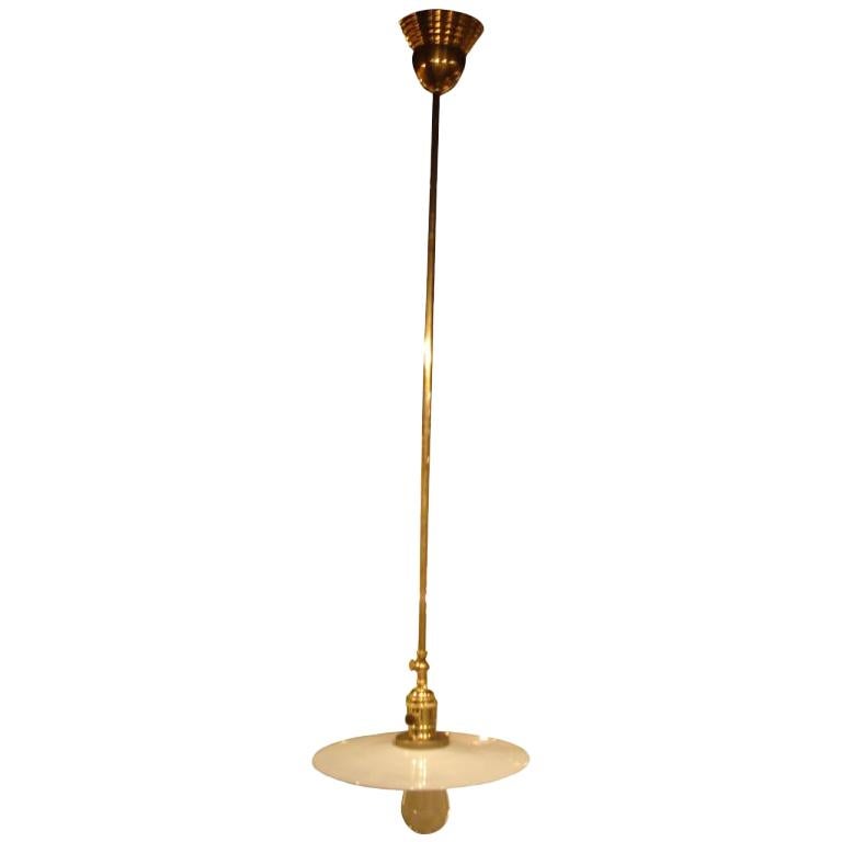 Brass Hanging Light Fixture with Antique Milk Glass Disk Shade For Sale