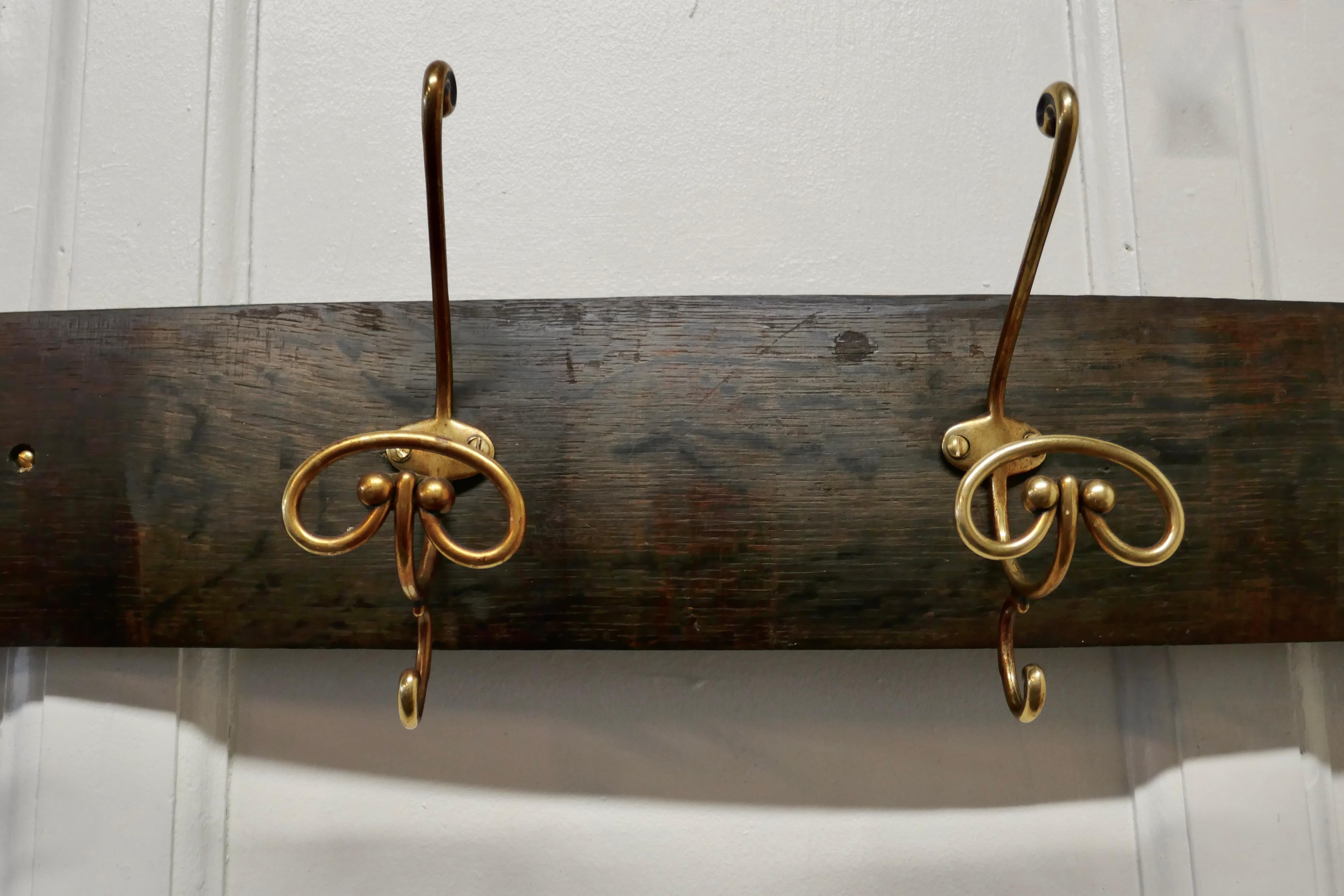 Rustic Brass Hat and Coat Hooks, Set on Wine Barrel Oak For Sale