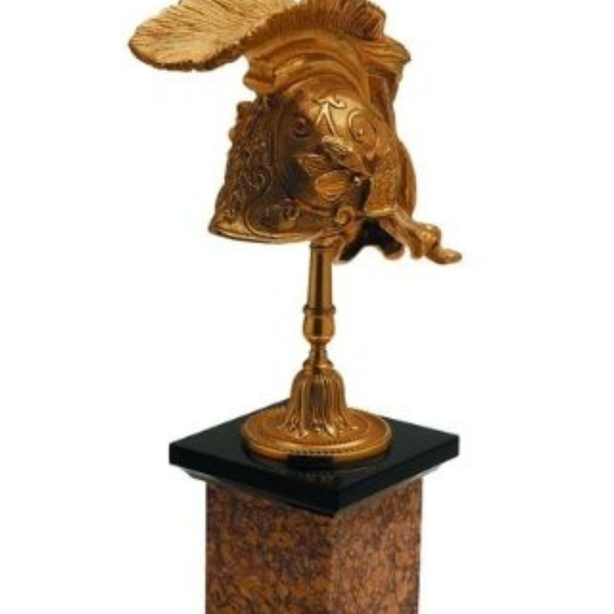 Contemporary Arthur decorative natural brass helm with black and brown marble base For Sale