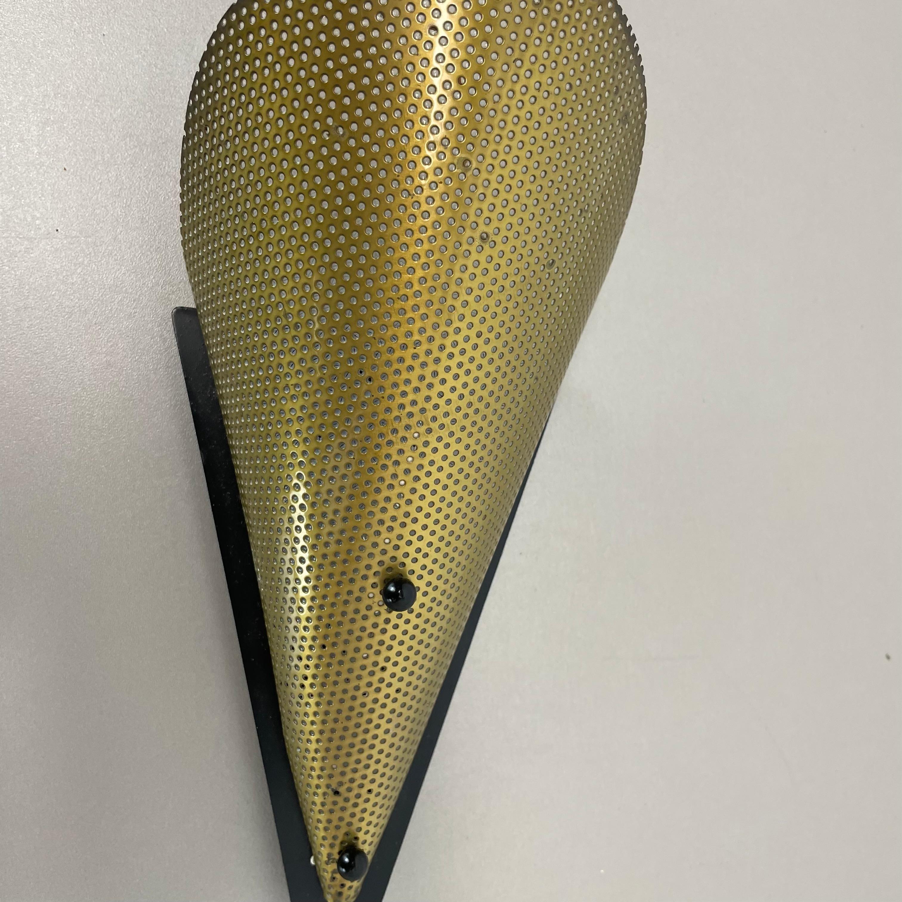 20th Century brass hole pattern Theatre Wall Light Sconce MATEGOT Style, France, 1950 For Sale