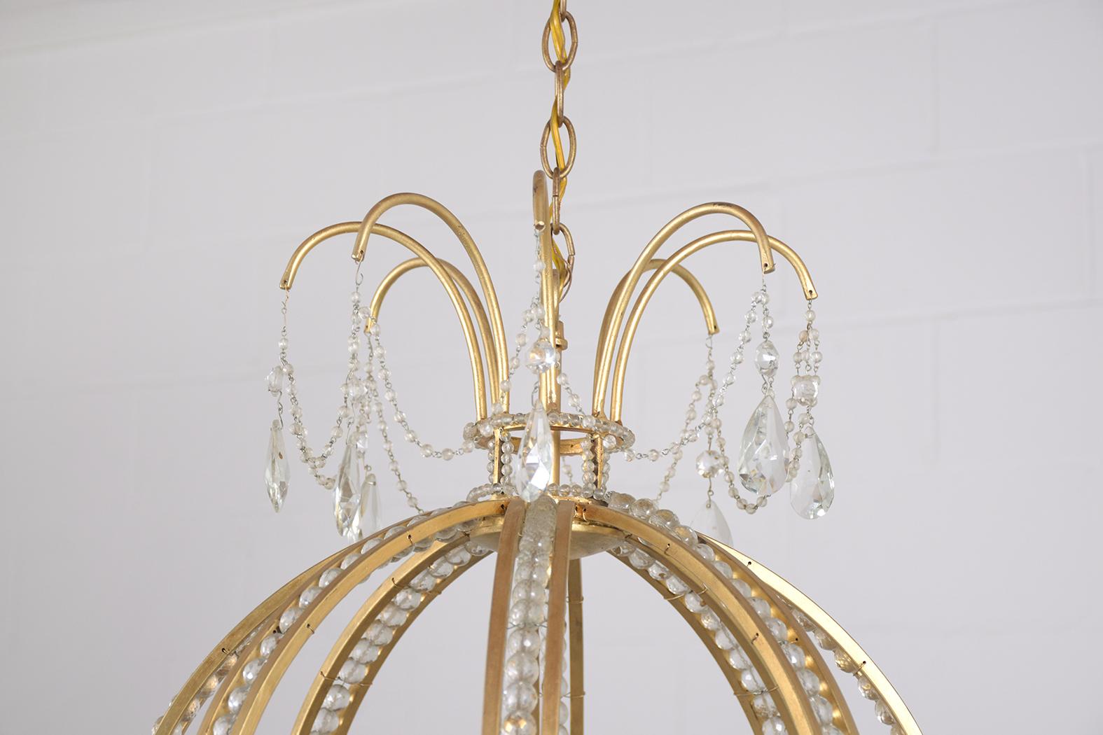 Mid-20th Century Restored 1910s Vintage Brass Crystal Hollywood Regency Chandelier For Sale