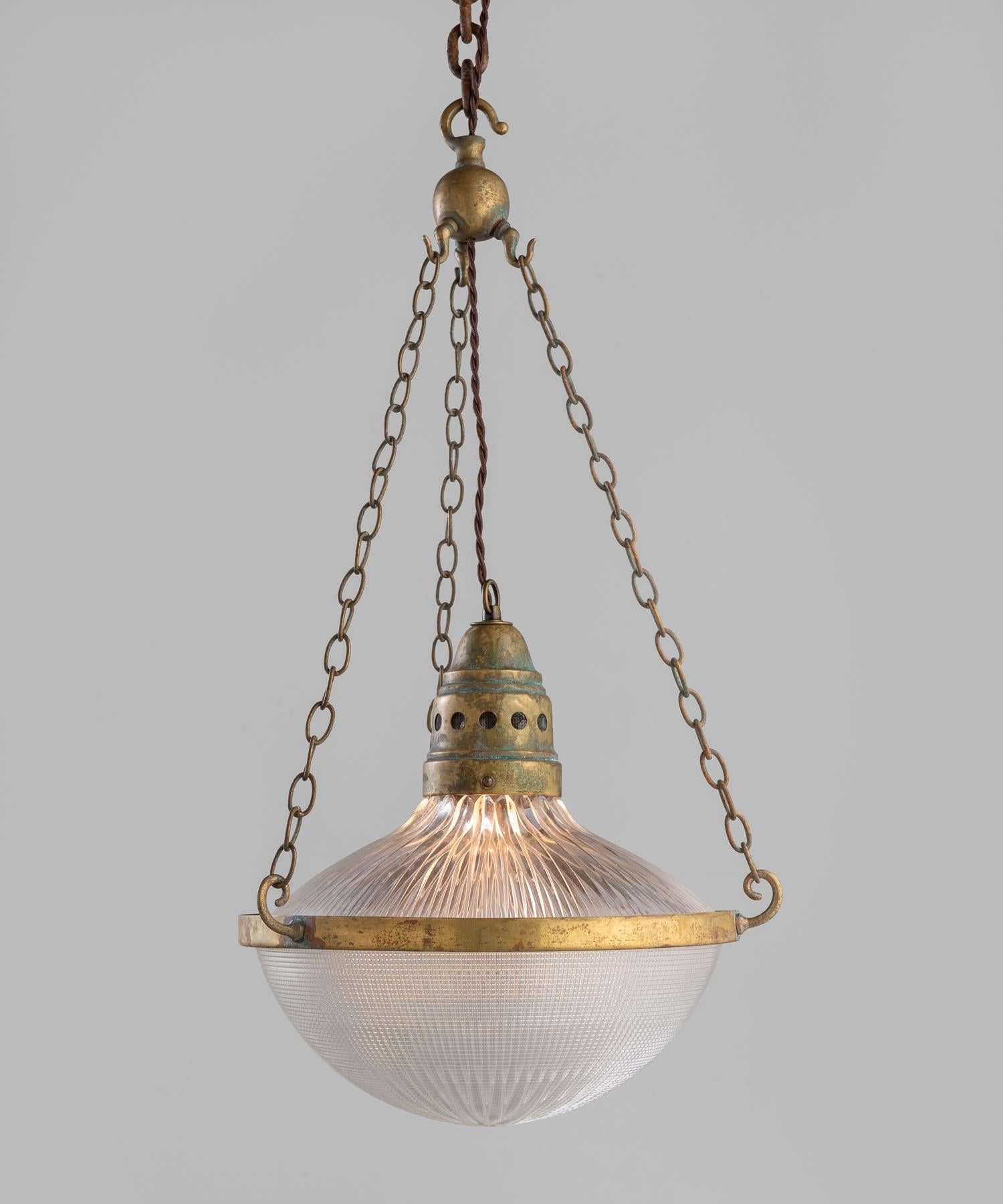 Brass Holophane Lantern, England, circa 1930

Marked holophane glass with original brass central cage and gallery.