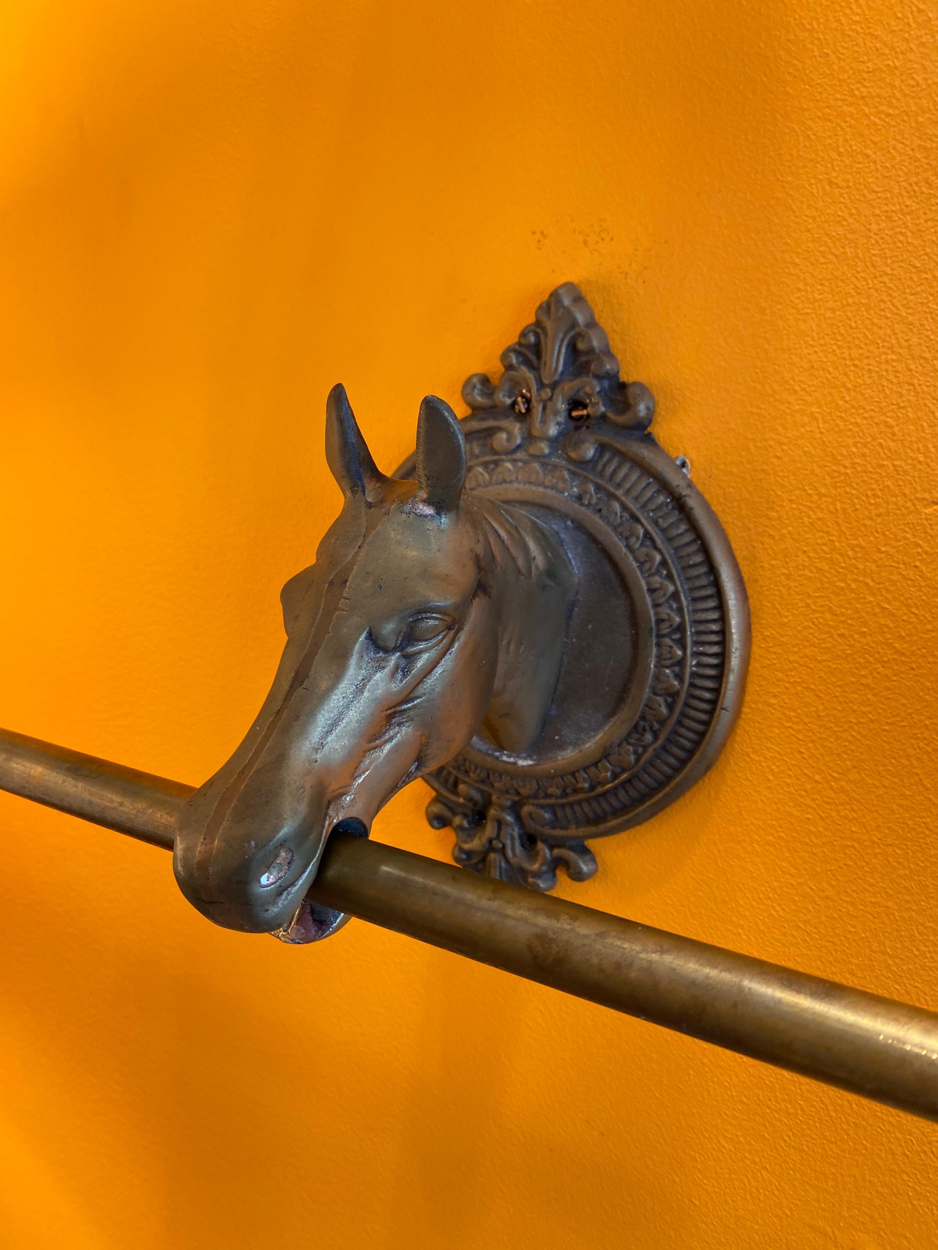 Unknown Adjustable brass towel bar with horse head mounting brackets