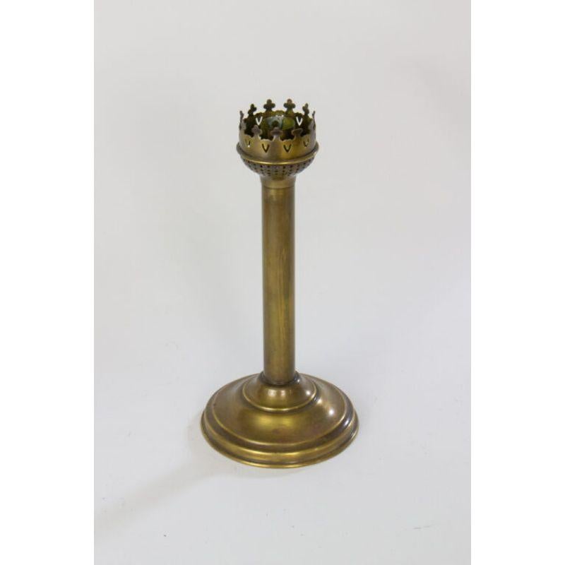 Brass candle holder with blown glass hurricane shade. Glass shade is clear with cut and etched grape and floral designs. Mid 19th Century. European. Brass has a lovely patina, Glass is in excellent condition. For candle.

Dimensions: 5 × 5 × 17 in