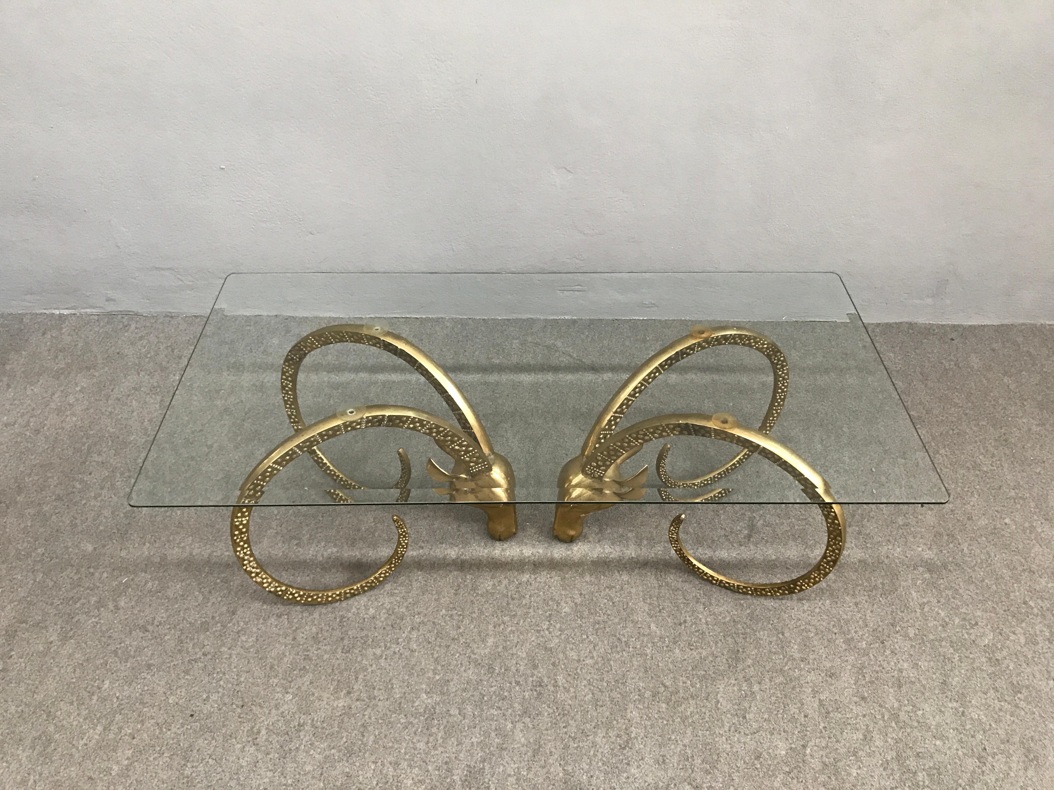 Stunning brass ram's head or ibex attributed to Alain Chervet.
Original glass top.