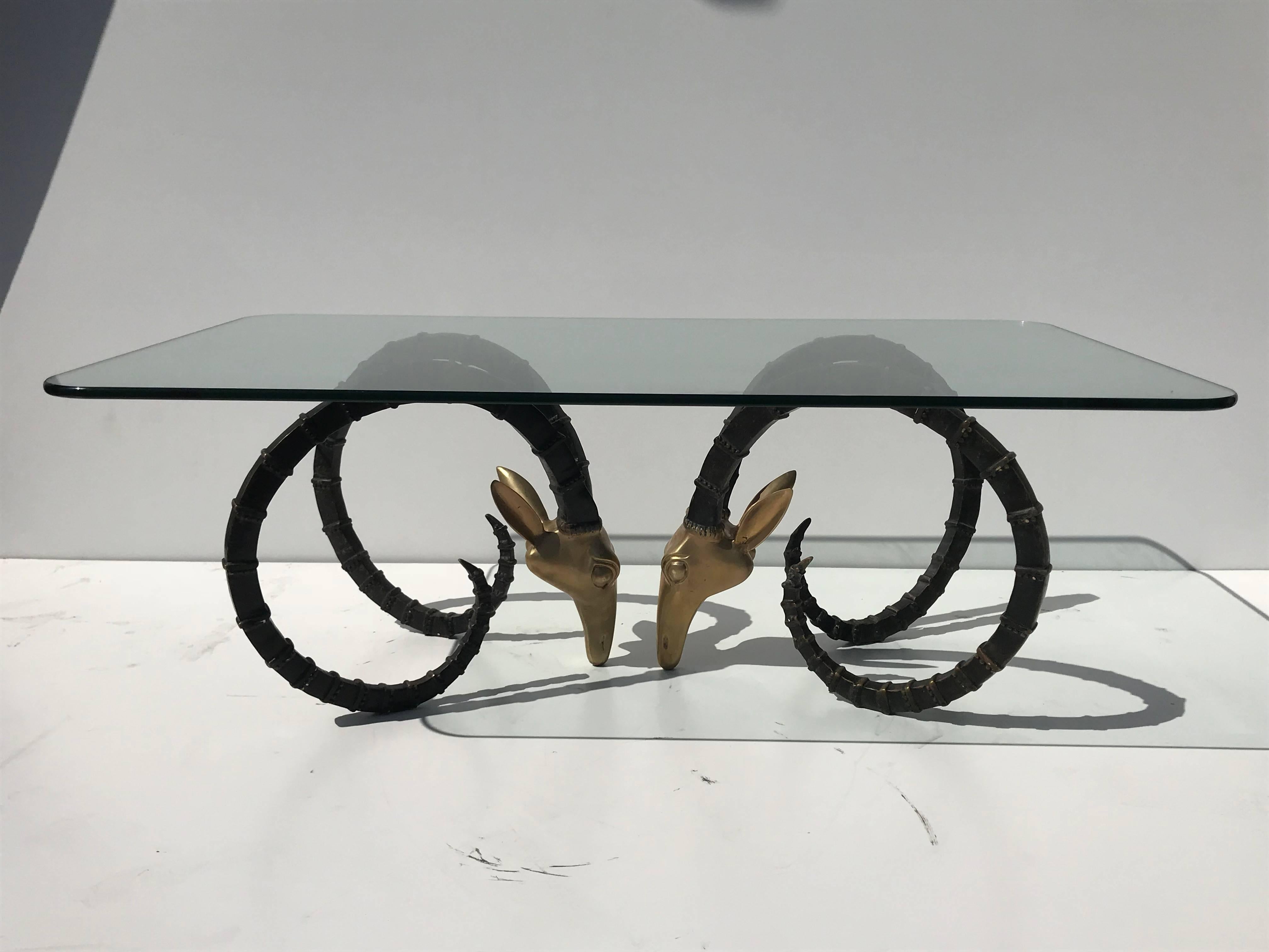 Brass ibex or ram head coffee table in the style of Alain Chervet
Each base is 19