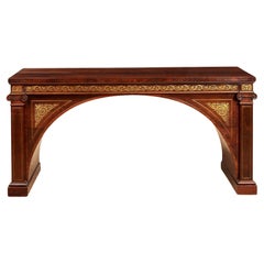 Table console en palissandre avec arc incrusté de laiton