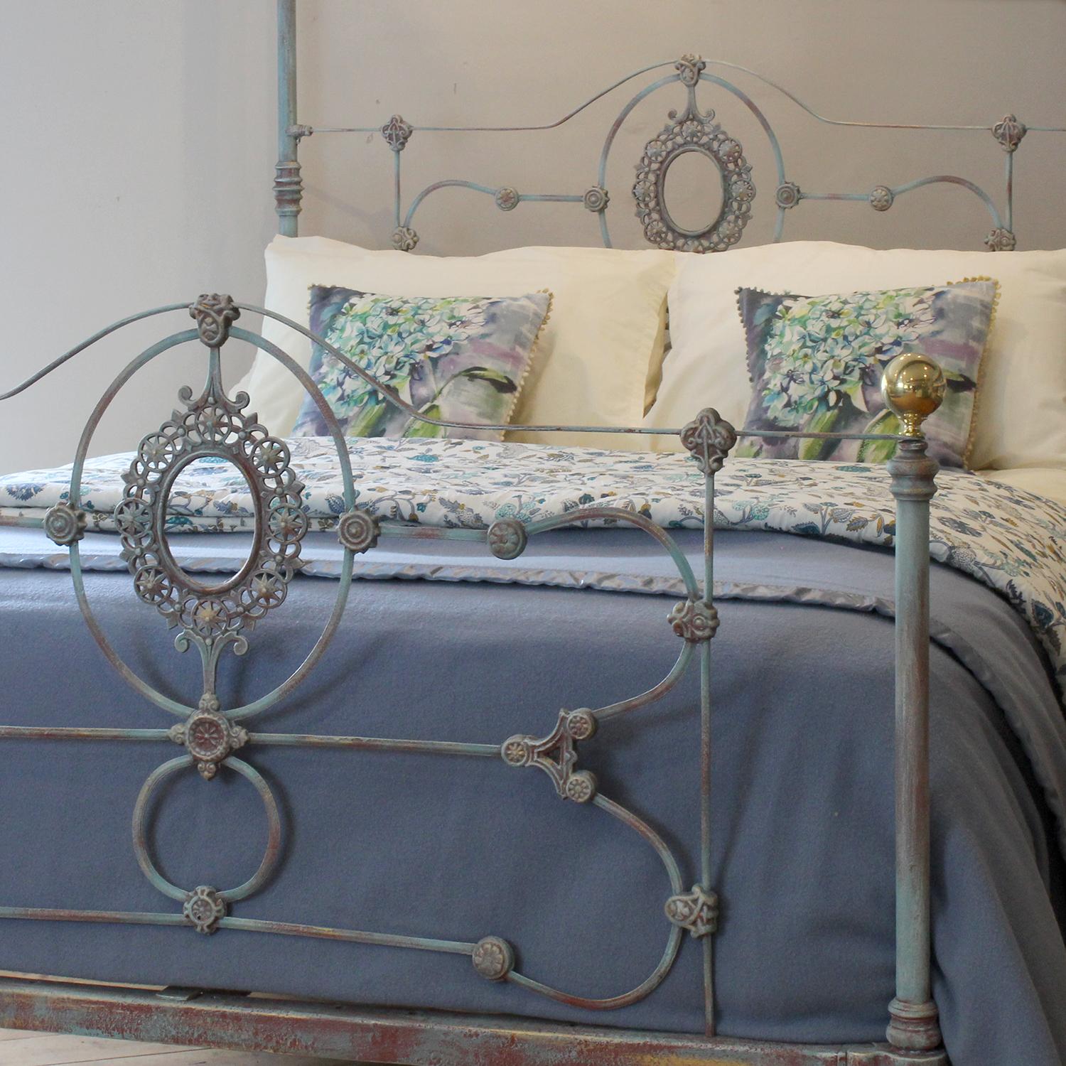 Beautifully painted Victorian half tester bedstead in our hand painted blue verdigris with decorative panels and central plaques in both head and foot panels. Circa 1880.

A firm bed base is included in the price. 

Mattress, bedding, bed linen