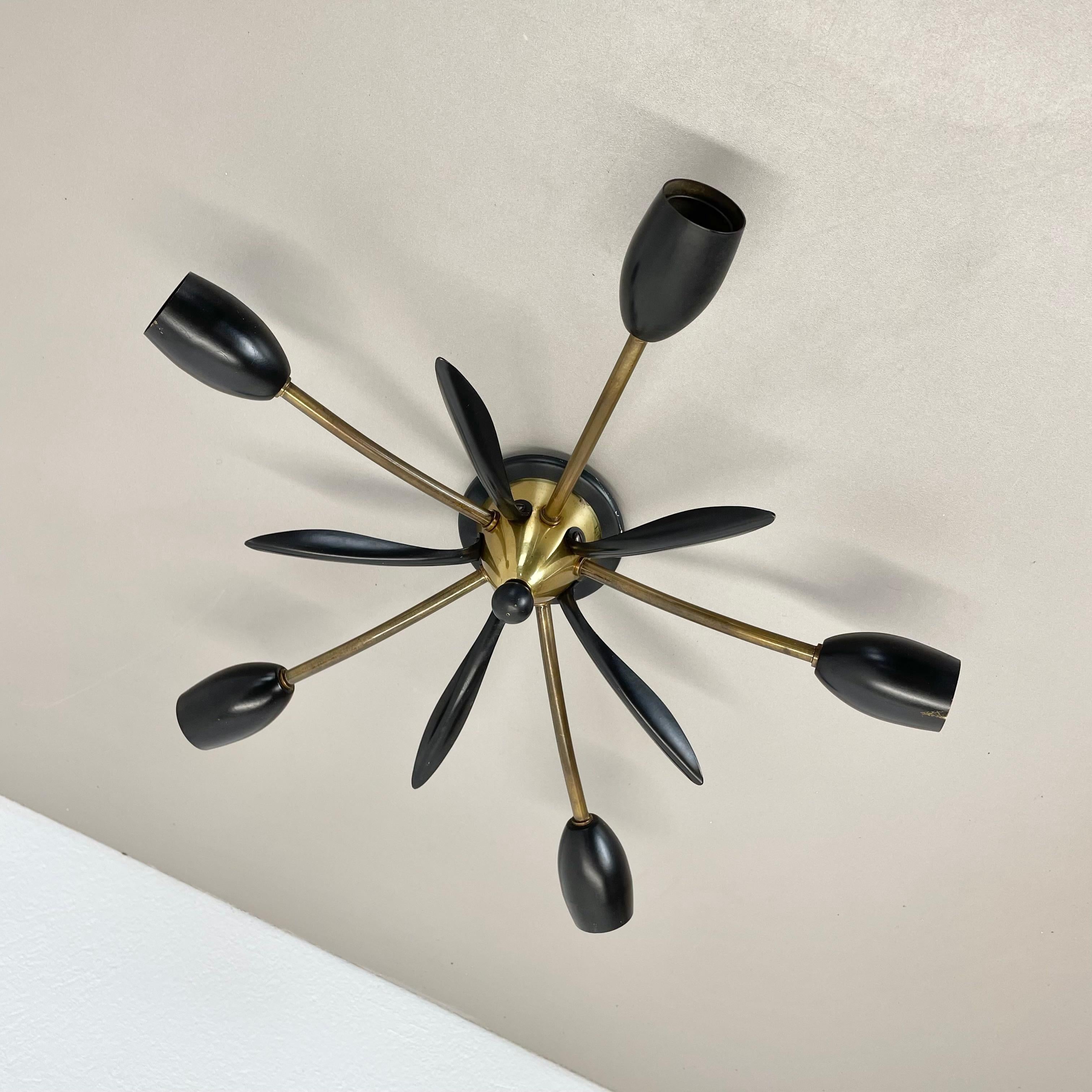 Article:

Ceiling light


Producer:

Origin Italy 
in the manner of Stilnovo, Gio Ponti



Age:

1950s



This modernist light was produced in Italy in the 1950s. It is made from solid metal brass with brass with 5 light arm elements. the light arms