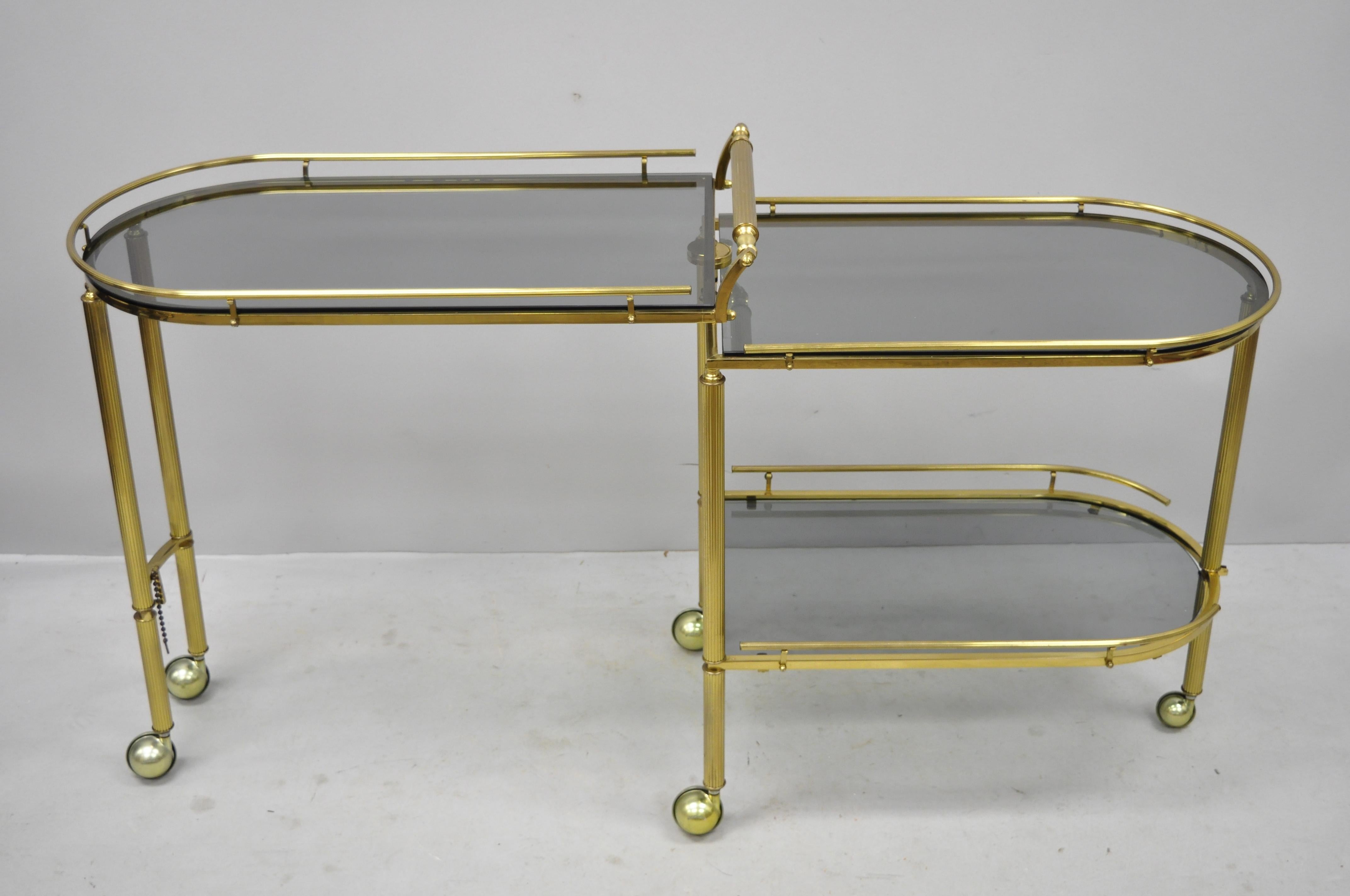 Brass Italian Hollywood Regency Swivel Rolling Bar Cart Server with Smoked Glass In Good Condition For Sale In Philadelphia, PA