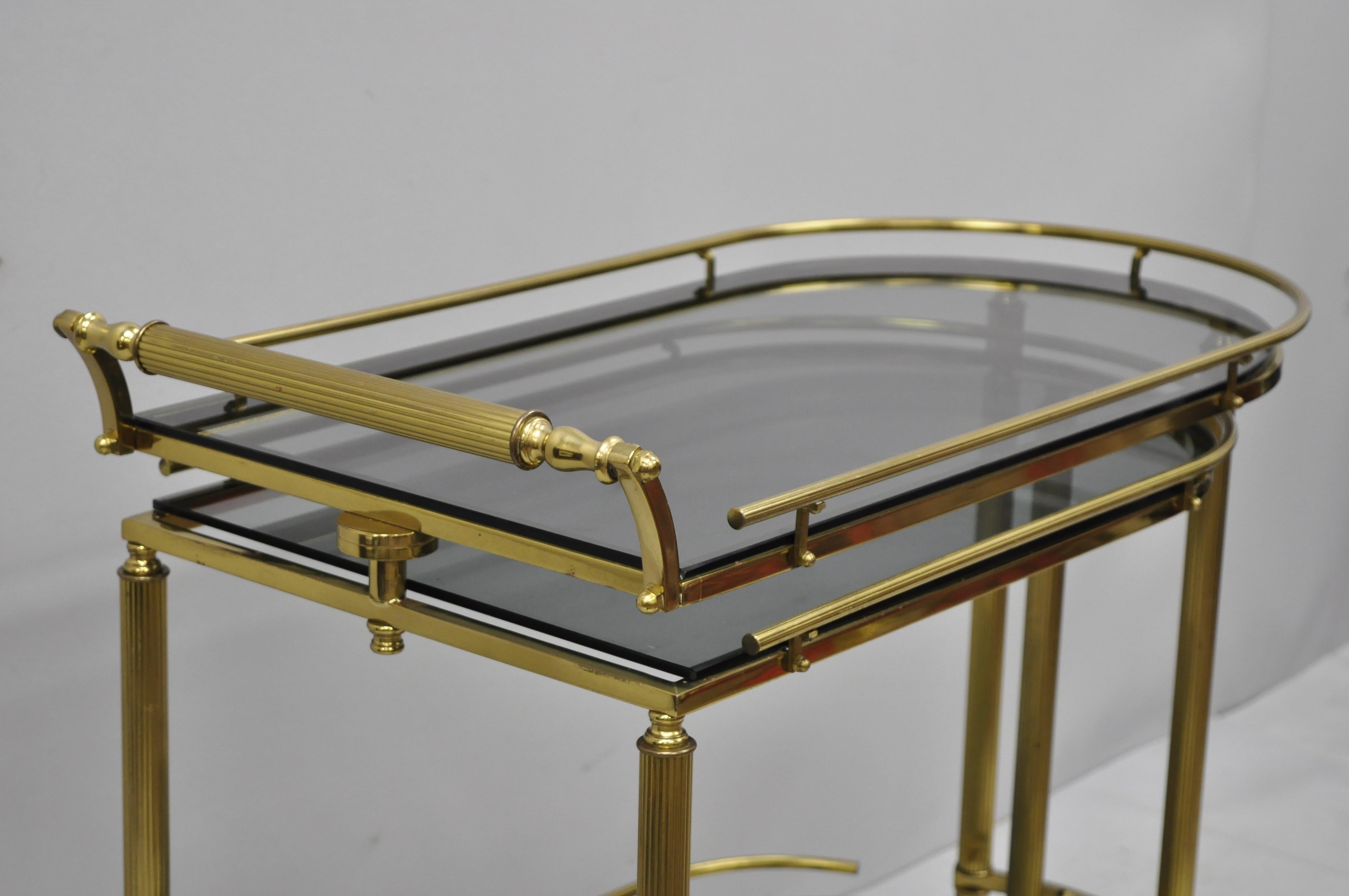 20th Century Brass Italian Hollywood Regency Swivel Rolling Bar Cart Server with Smoked Glass For Sale