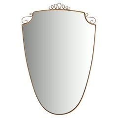 Brass Italian Mirror with Scroll Top in the Style of Gio Ponti