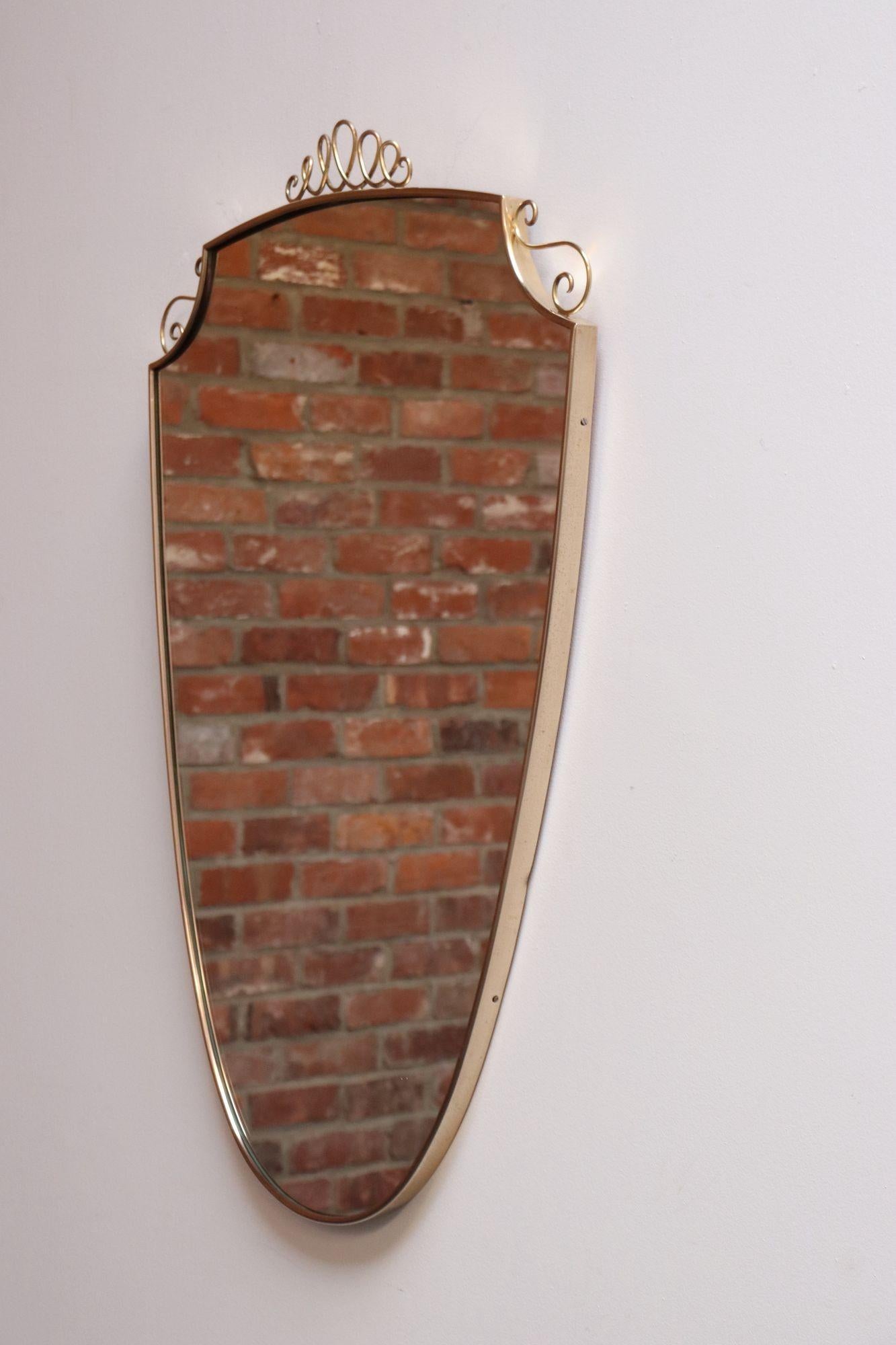 Mid-Century Modern Brass Italian Modern Mirror with Coronet and Scroll Decoration after Gio Ponti
