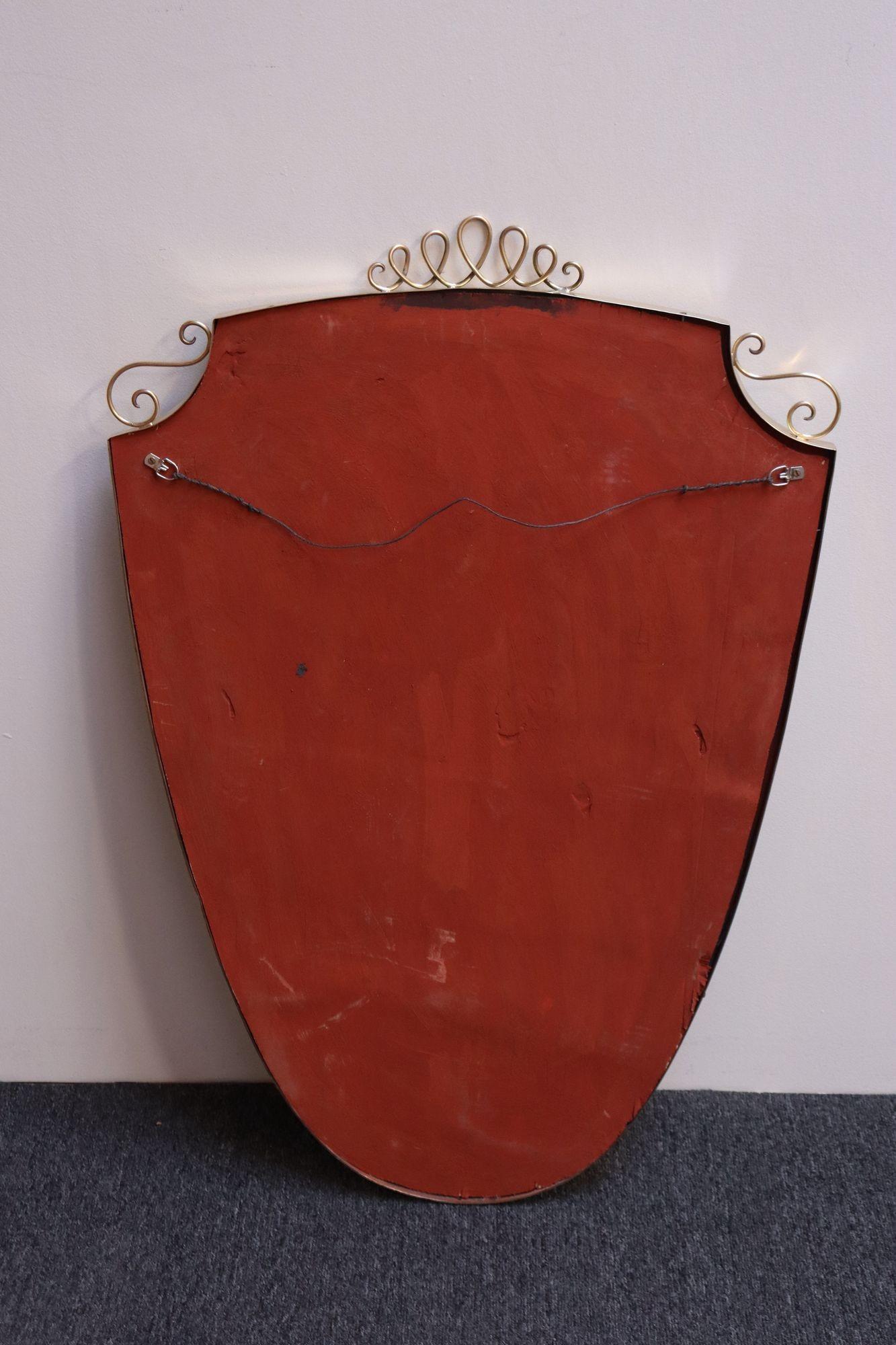 Mid-20th Century Brass Italian Modern Mirror with Coronet and Scroll Decoration after Gio Ponti