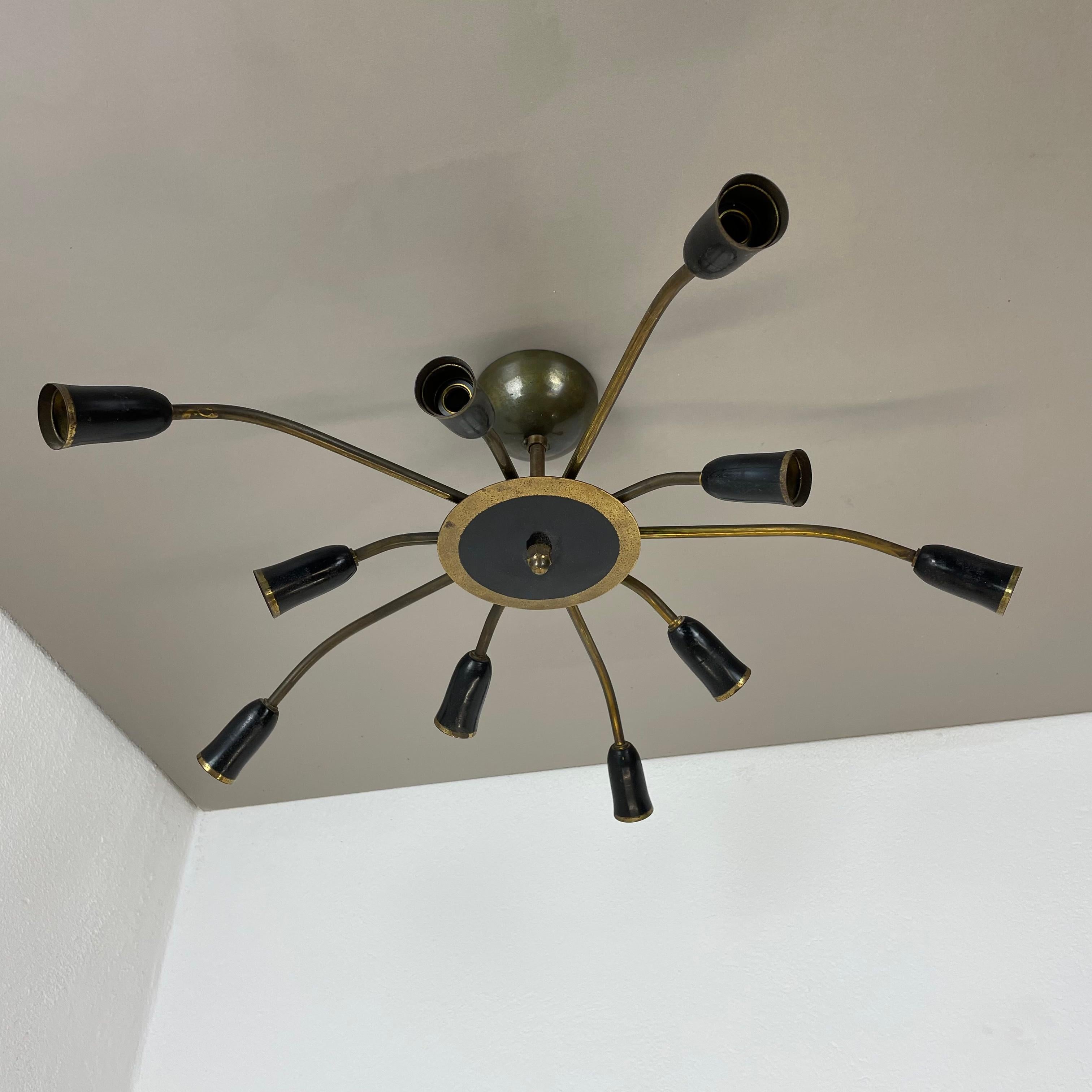 Article:

Ceiling light


Producer:

Origin Italy 
in the manner of Stilnovo, Gio Ponti



Age:

1950s



This modernist light was produced in Italy in the 1950s. It is made from solid metal brass with brass with 10 light arm