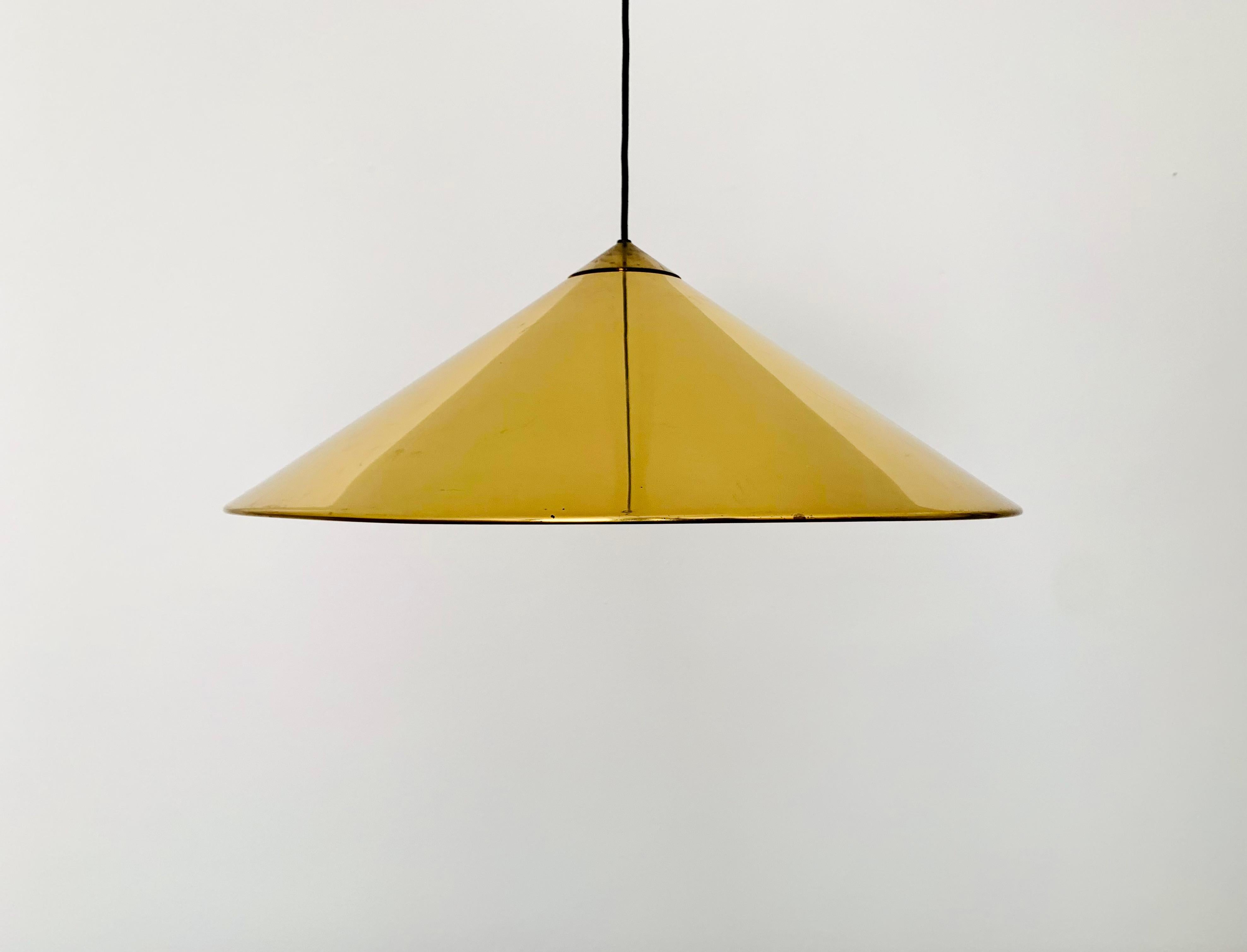 Very nice brass pendant lamp from the 1960s.
The lighting effect of the lamp is extremely beautiful.
The design and the very beautiful details create a very noble and pleasant light.
The lamp creates a very cozy atmosphere and is of very high