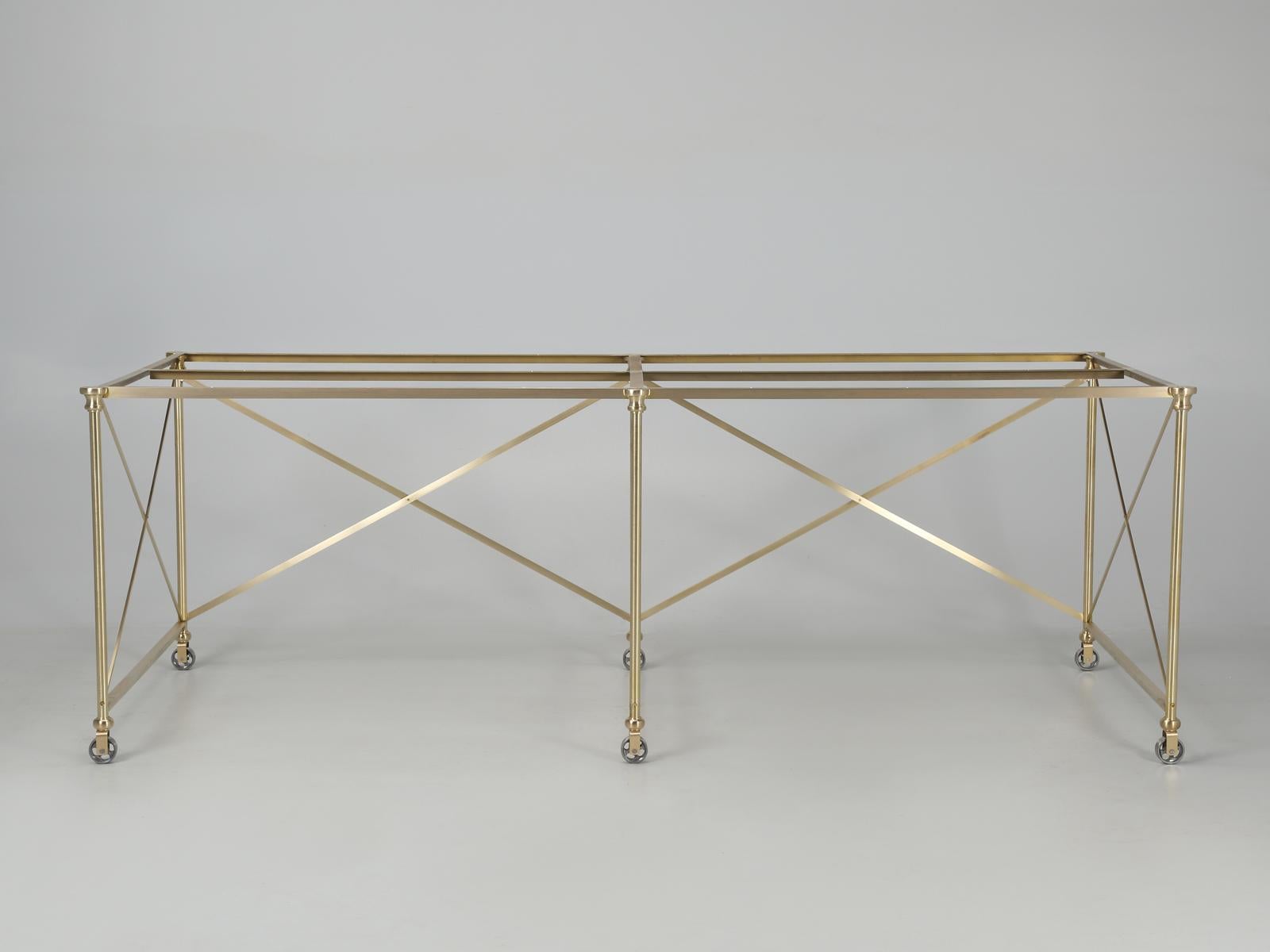 Our French inspired Industrial style kitchen island or possible dining table or even a console table, is custom fabricated here in Chicago from solid brass in virtually any dimension. Our brass kitchen island can also be crafted from stainless steel