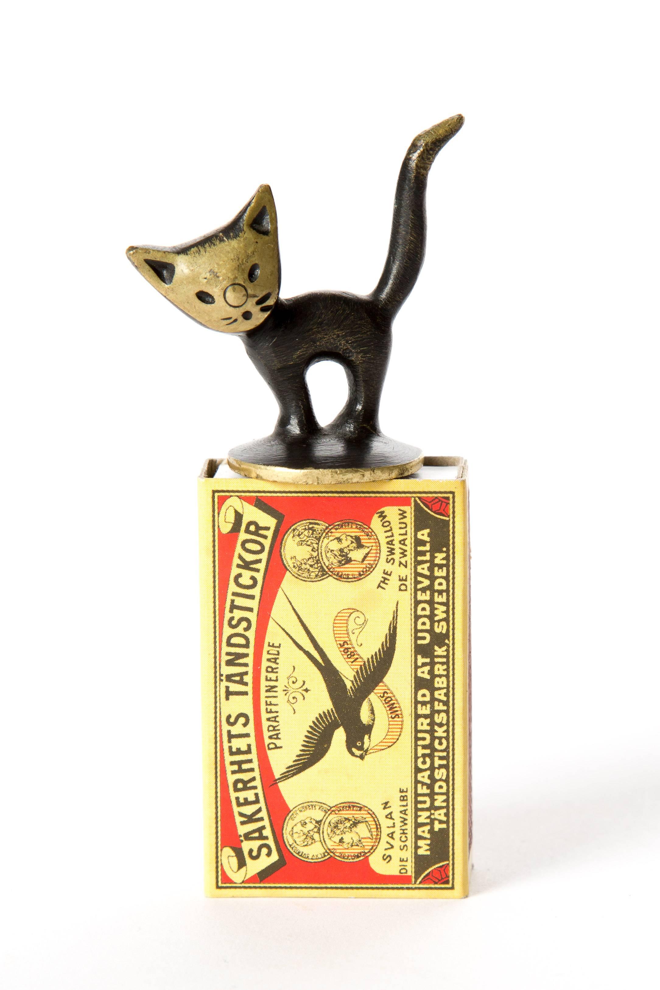 Brass kitten cat Walter Bosse. Young kitten made of blackened brass. There is a stamp underneath. Baller Austria. Probably made for extinguish fire of a cigarette.