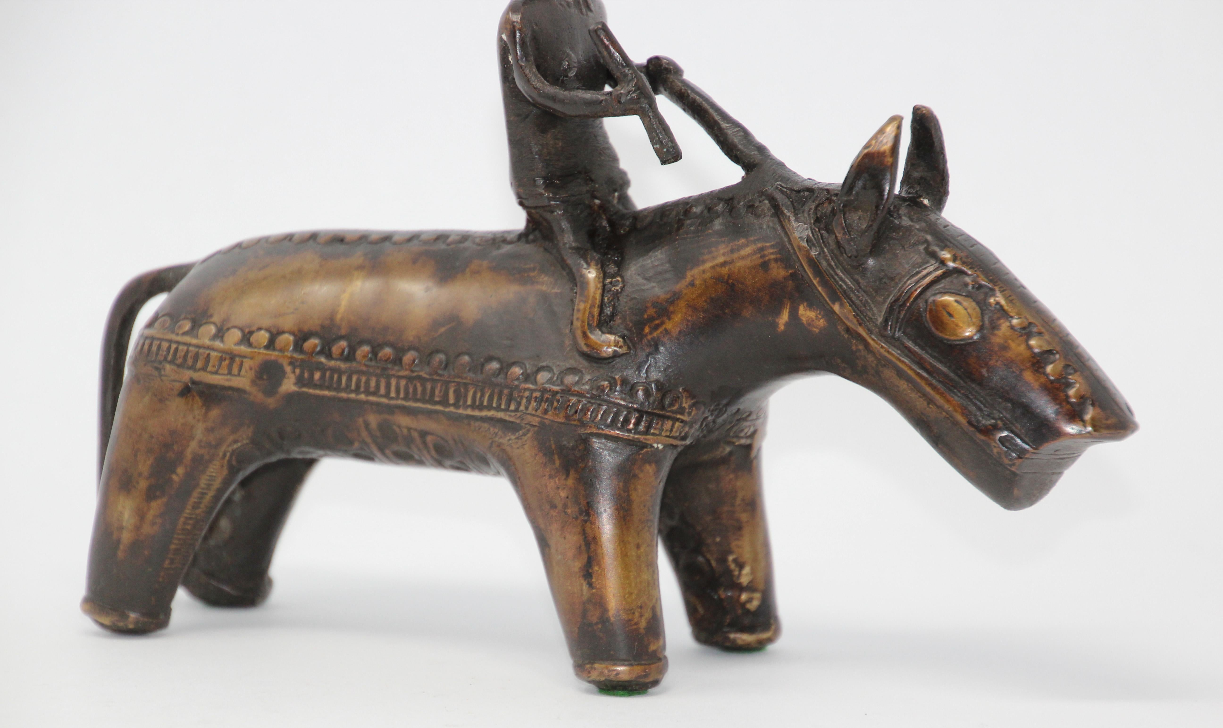 Wonderful decorative and heavy cast brass of a warrior horse or beast rider.
The horse and warrior are very modern tribal elongated form.
The tribal horse sculpture was produced using the traditional 'lost wax' process.
Lost wax method is the