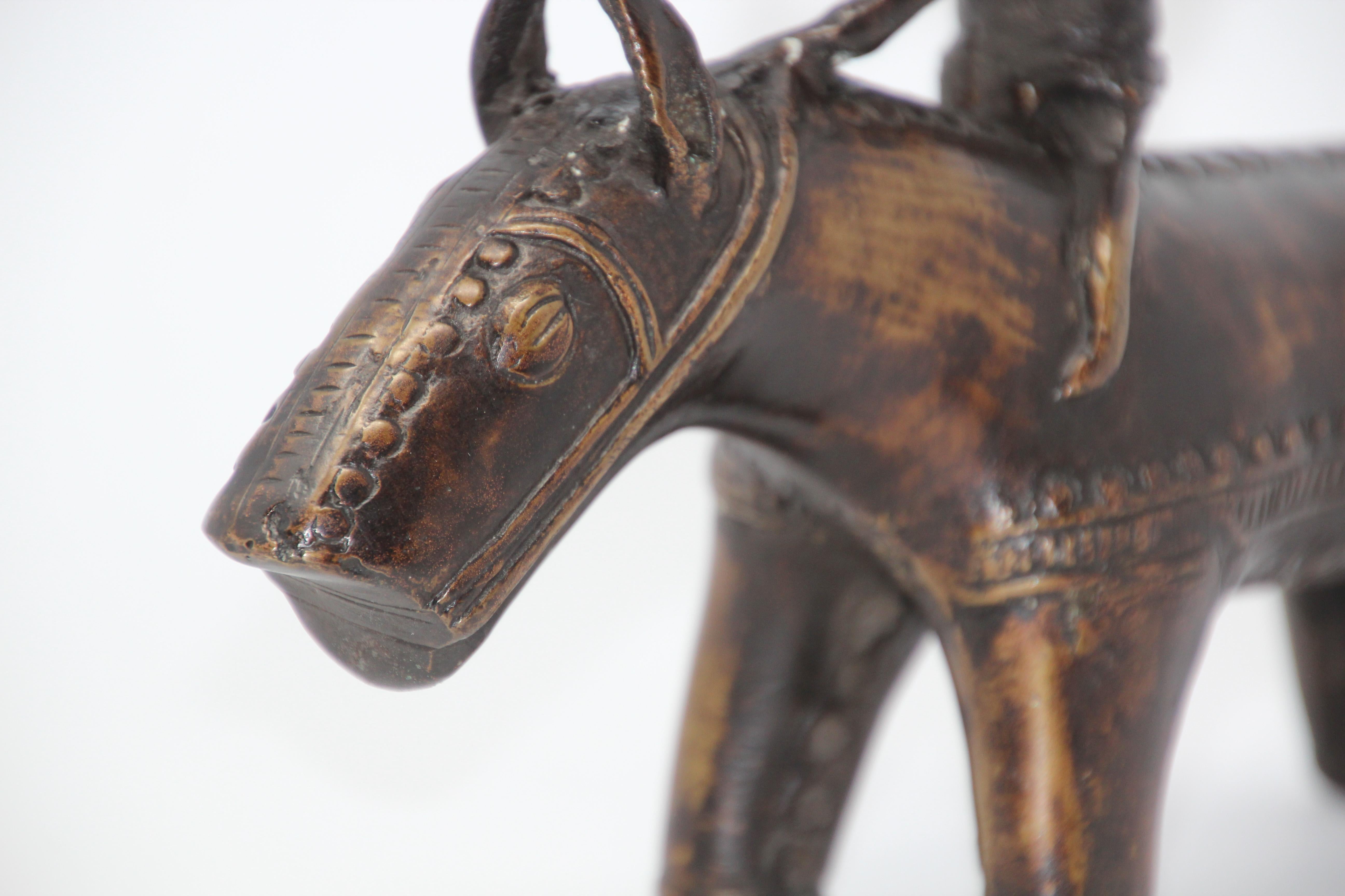 Cast Brass Kondh Sculpture of a Tribal Warrior Riding a Beast For Sale