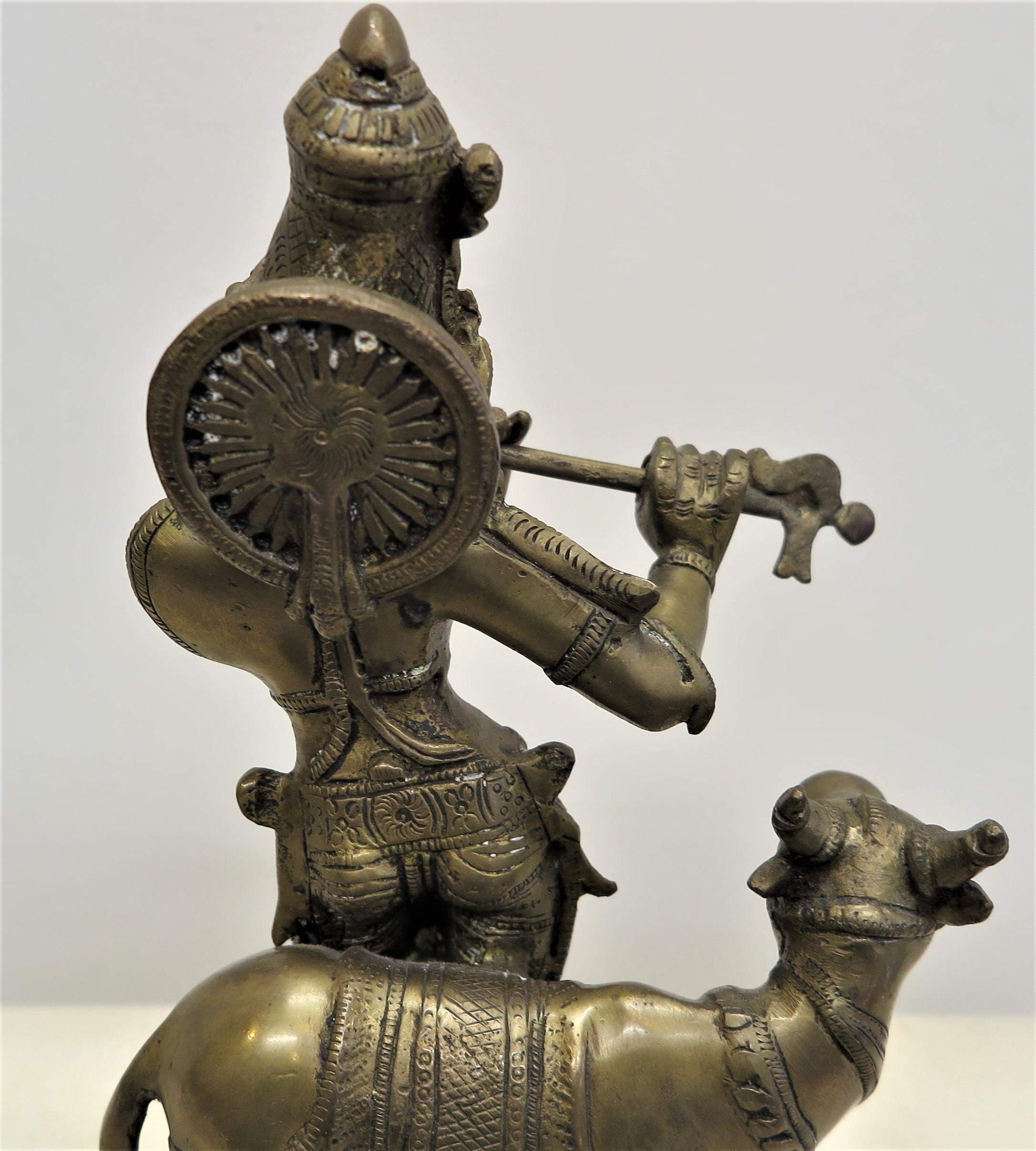 Statue Krishna en laiton avec Nandi Bon état - En vente à New York, NY