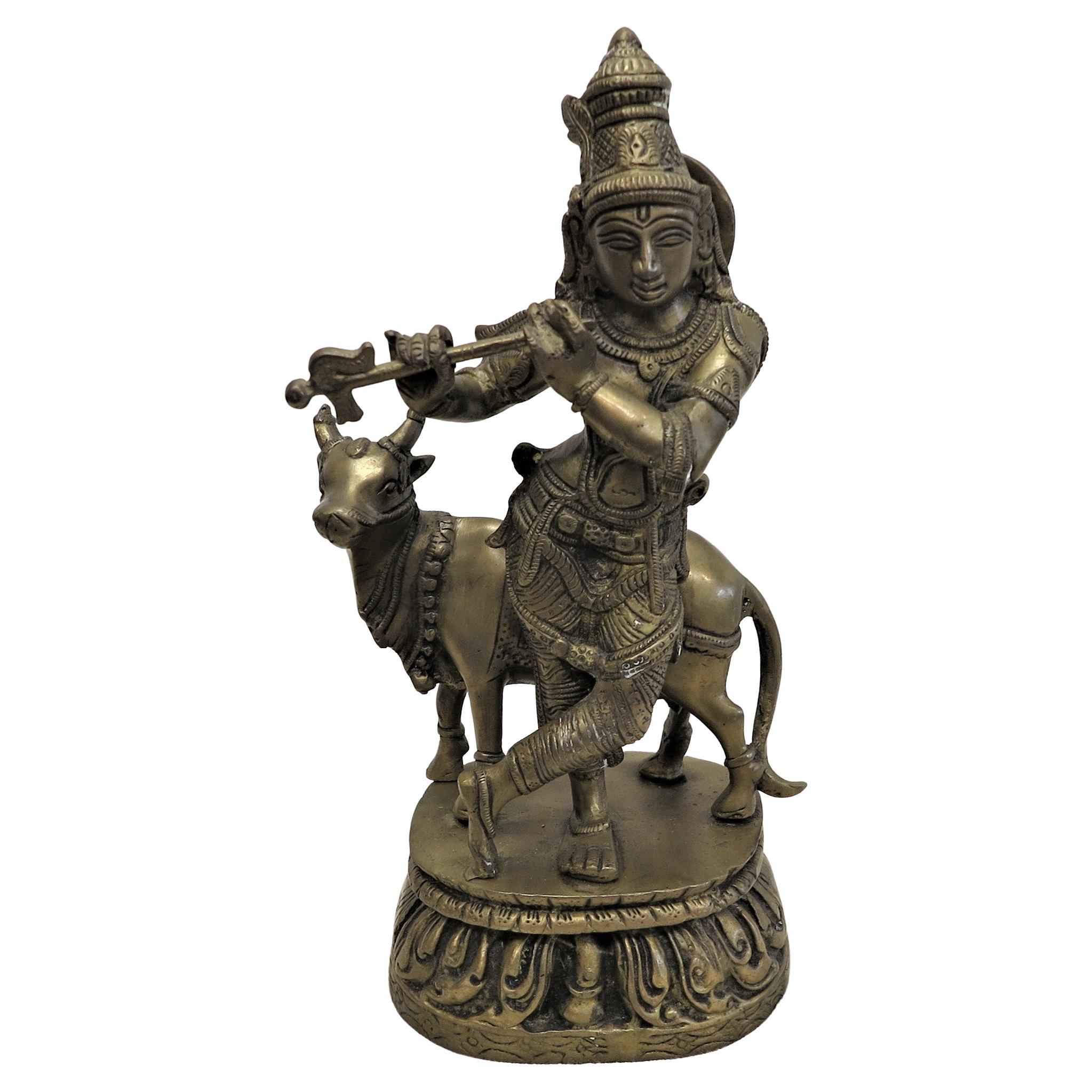 Statue Krishna en laiton avec Nandi en vente