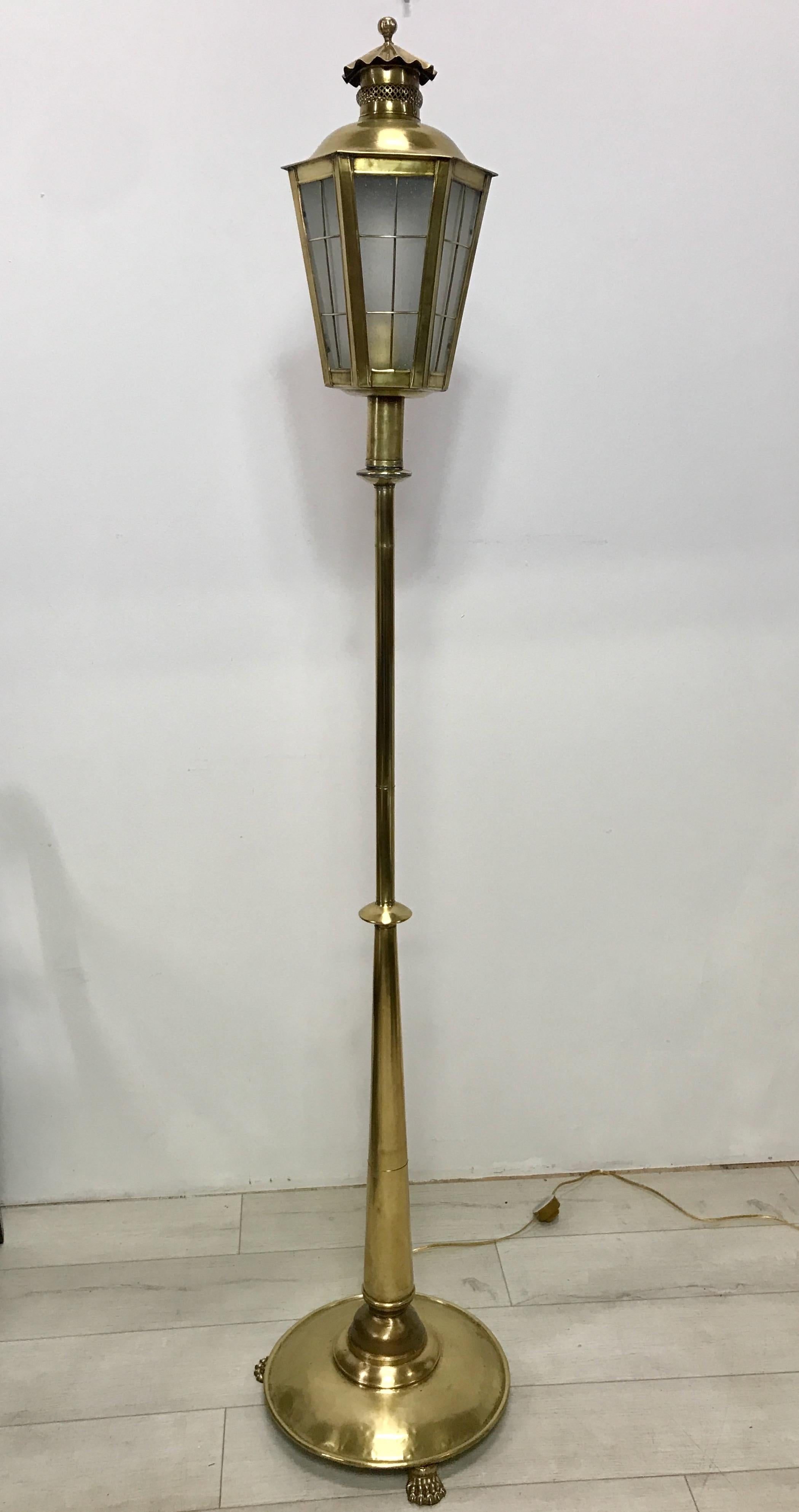 Unusual brass lantern floor lamp, originally a candle lantern now converted to electric, holds a single standard size bulb.
Solid brass (not plated).
England, 19th century.
    