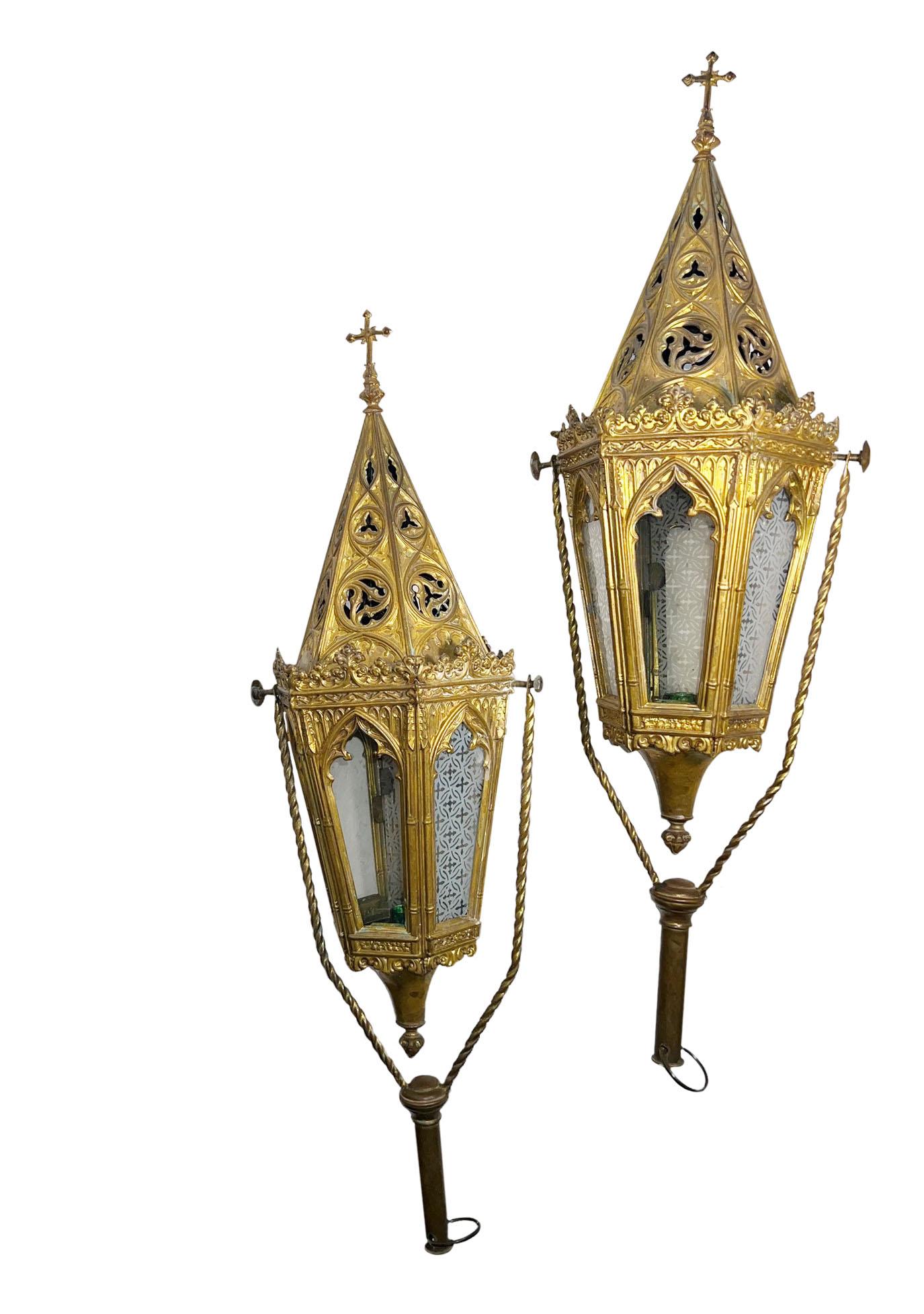 Pair of brass lanterns with hanging rings and etched glass. Circa 1910.  
