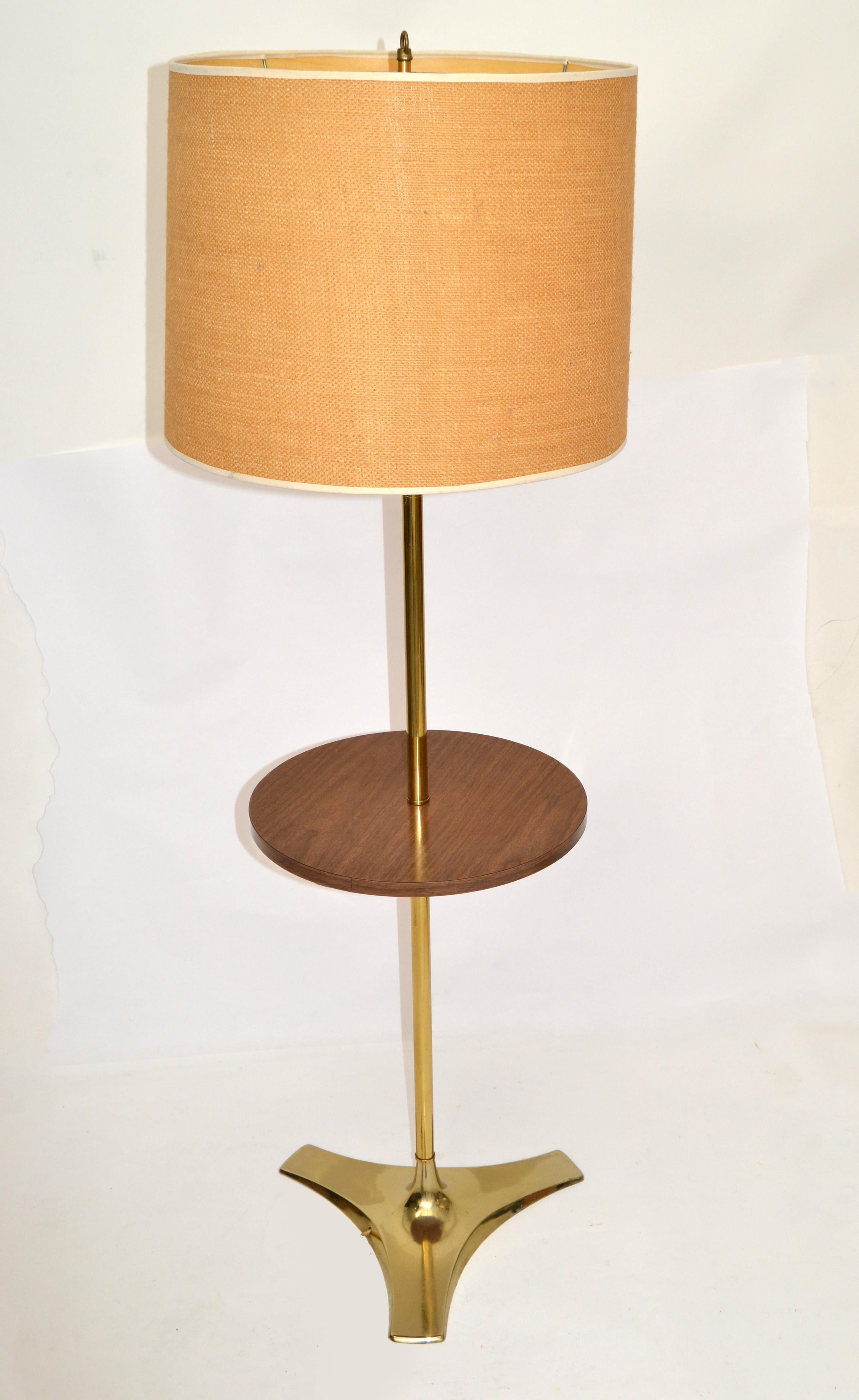Vintage brass round side table floor lamp made by Laurel Lamp Company. 
Features a cast brass tripod base, stem and round Laminate Wood Side Table.
Comes with this beautiful vintage Shade.
US Rewiring and takes 1 regular or LED Light.
Shade