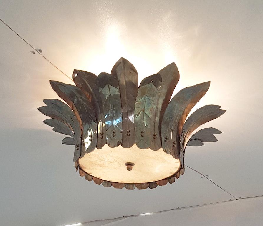 Italian semi flush mount with unlacquered bronzato brass leaves and Murano glass diffuser with granular texture / originally designed for the Goodtime Hotel Miami / made in Italy
3 lights / E26 or E27 type / max 60W each
Diameter: 22 inches,