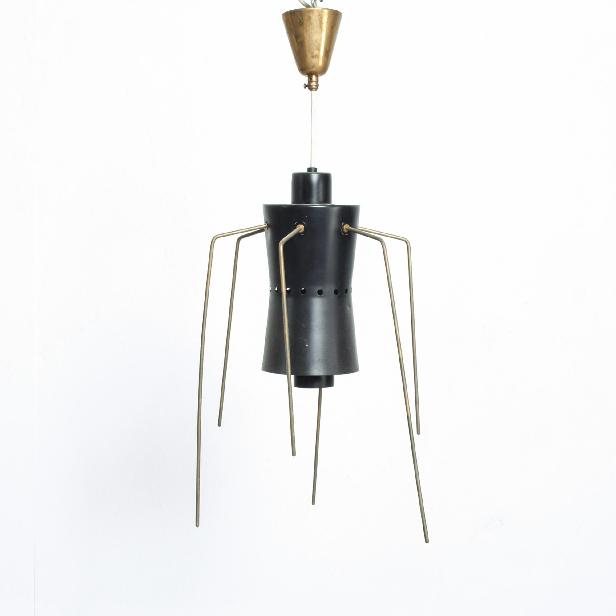 Spider leg chandelier pendant light from Italy 1950s
Chandelier designed as black spider bug with long brass legs constructed in ebonized metal and brass.
No maker label. Attribution stilnovo.
Dimensions: Height 22 in. x diameter 9