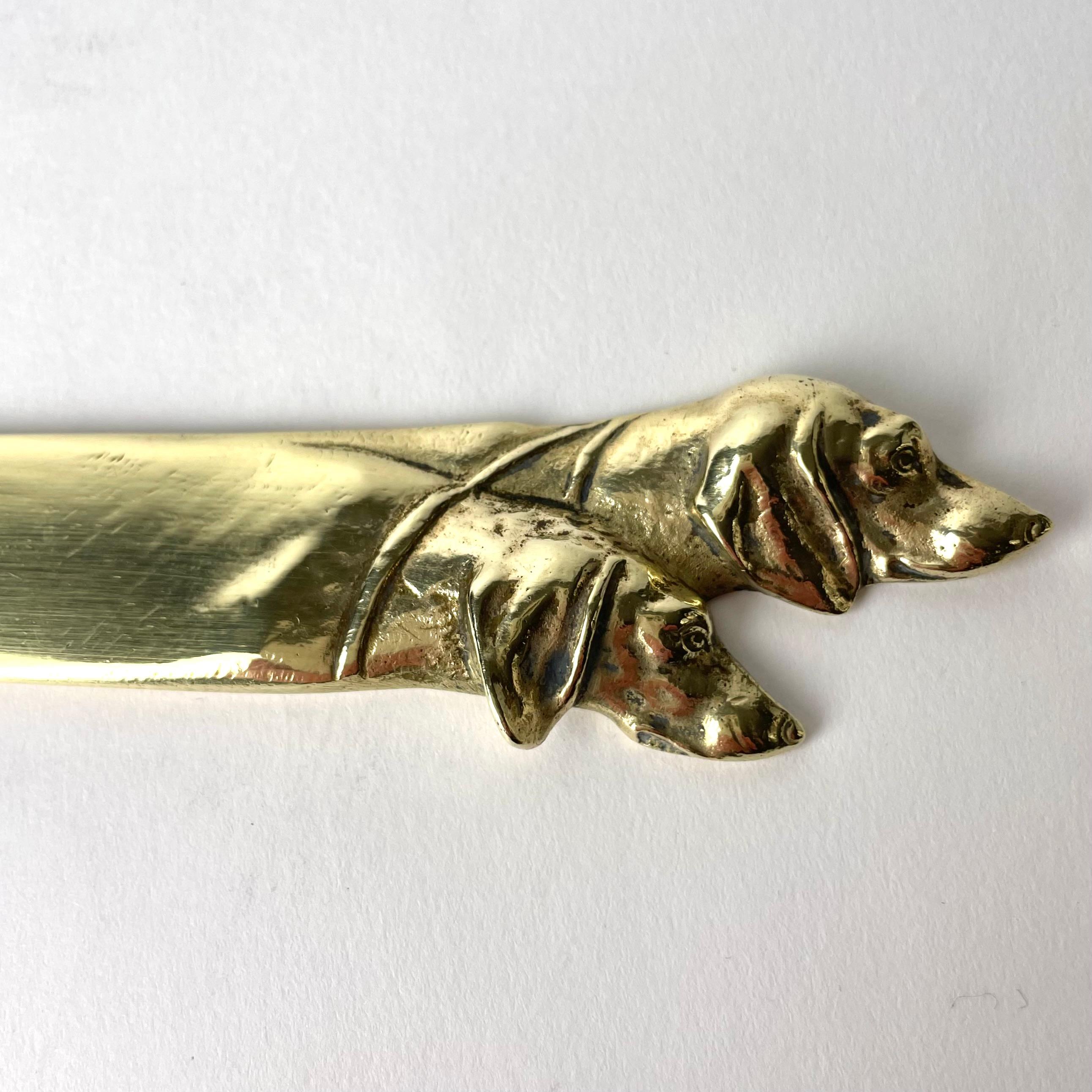 Brass Letter Opener decorated with dog heads from the early 20th Century For Sale 1