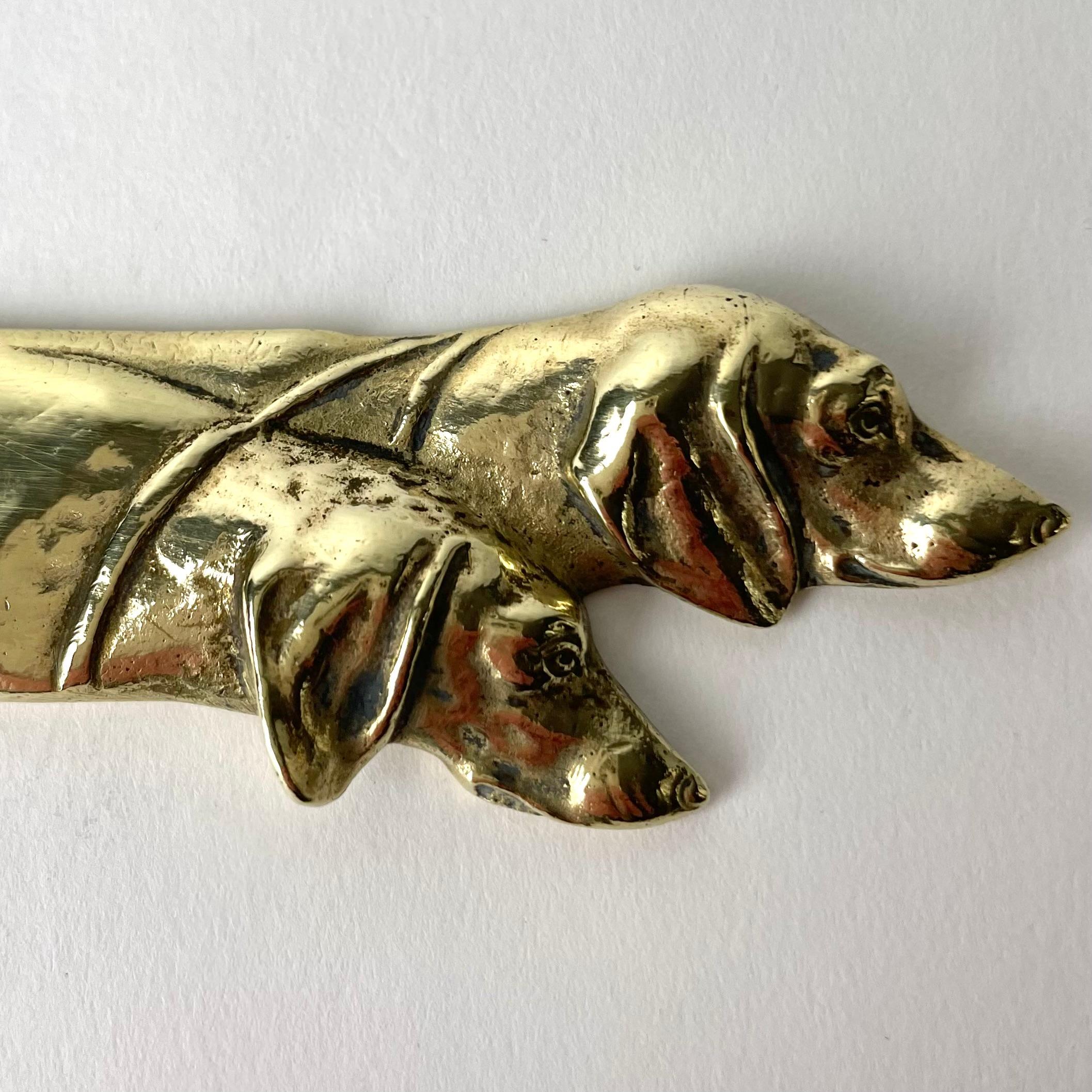 Brass Letter Opener decorated with dog heads from the early 20th Century For Sale 2
