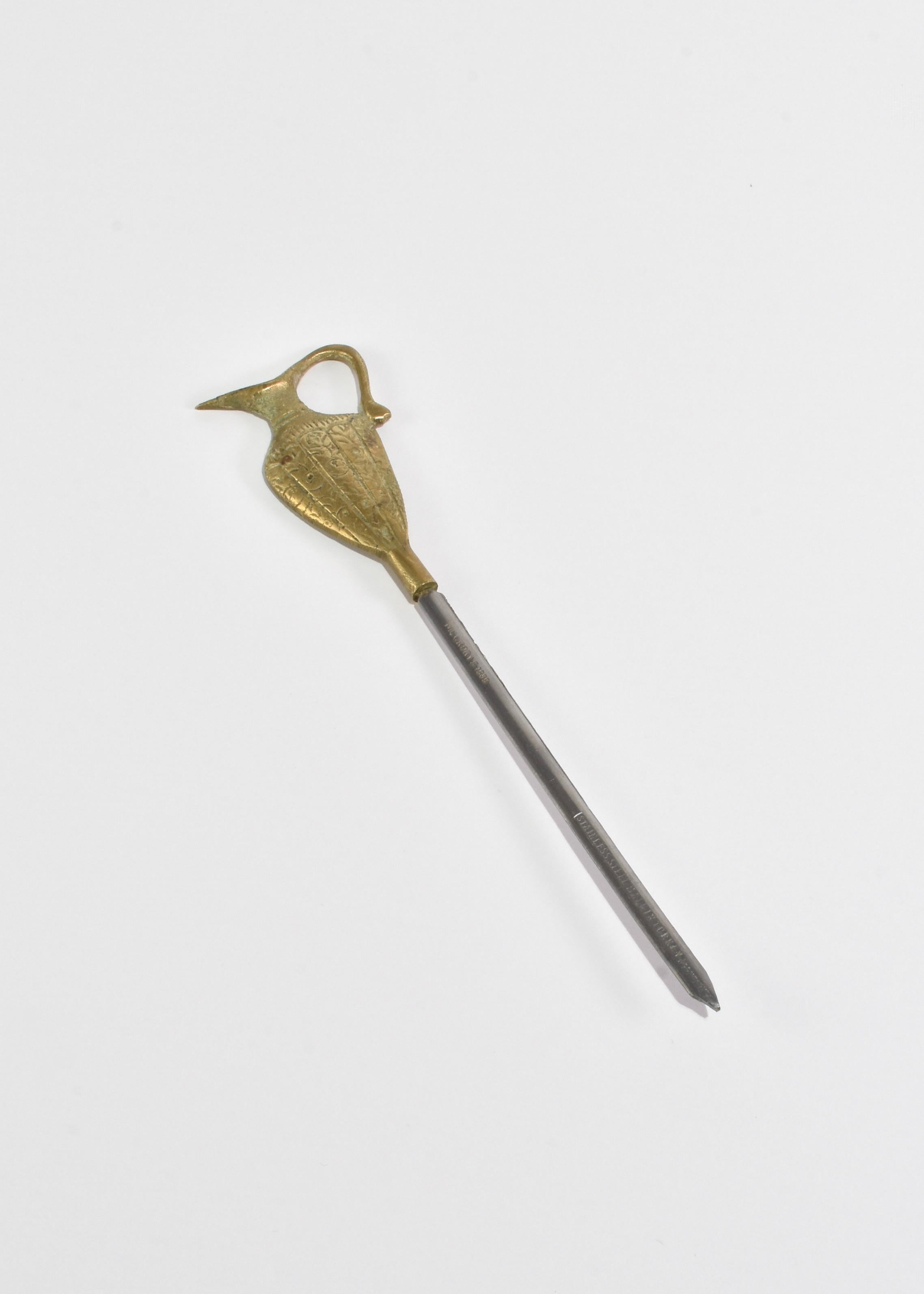 Vintage letter opener in stainless steel with a brass jug handle. Stamped McCrory's 1989, stainless steel, made in Turkey.
