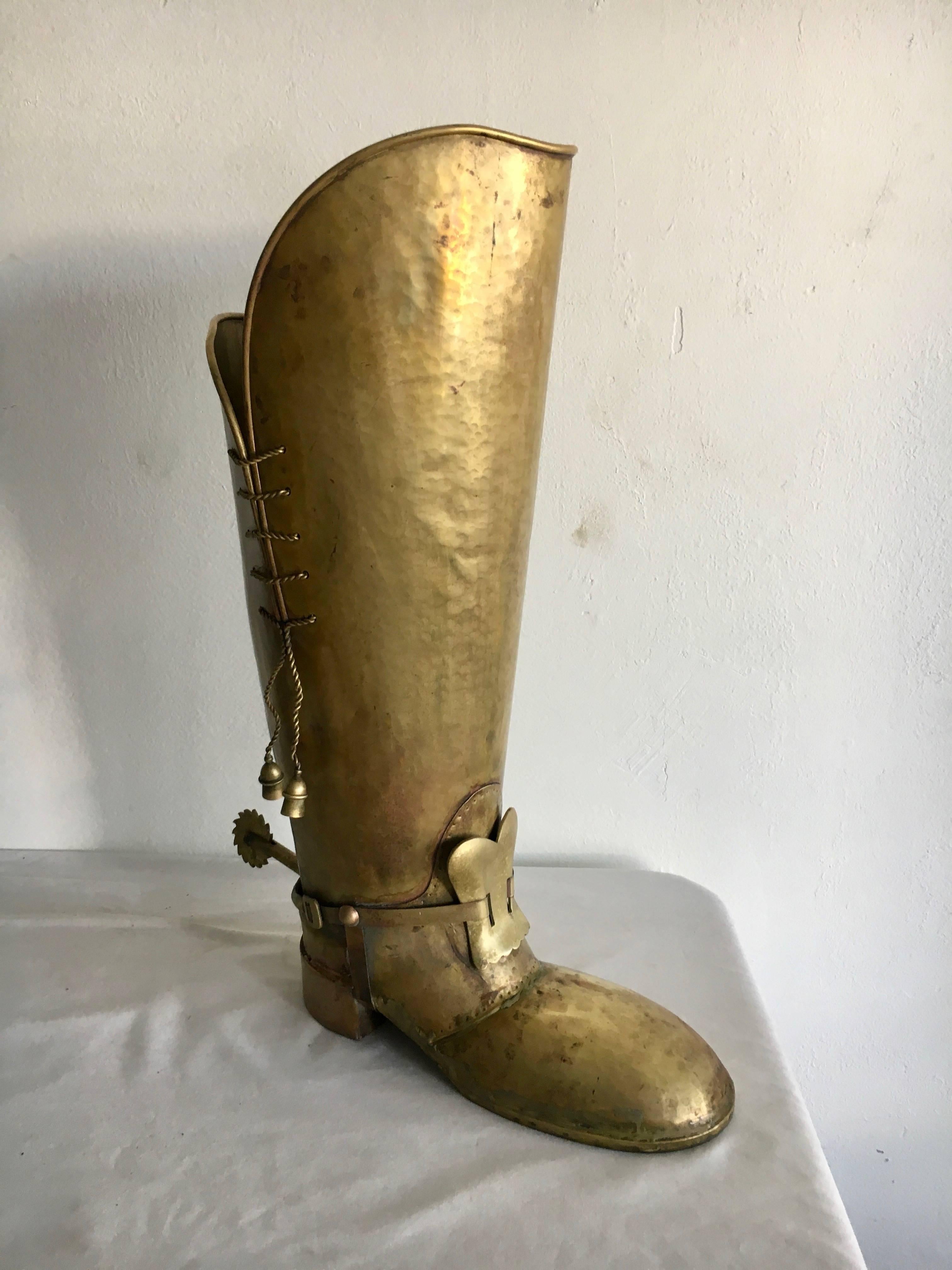 Brass Lombard boot umbrella stand, the boot has been re-welded, we have left the aged patinated look as we believe it enhances he integrity of the piece... a handsome piece with imperfections only adding to the rustic nature. Hold several umbrellas