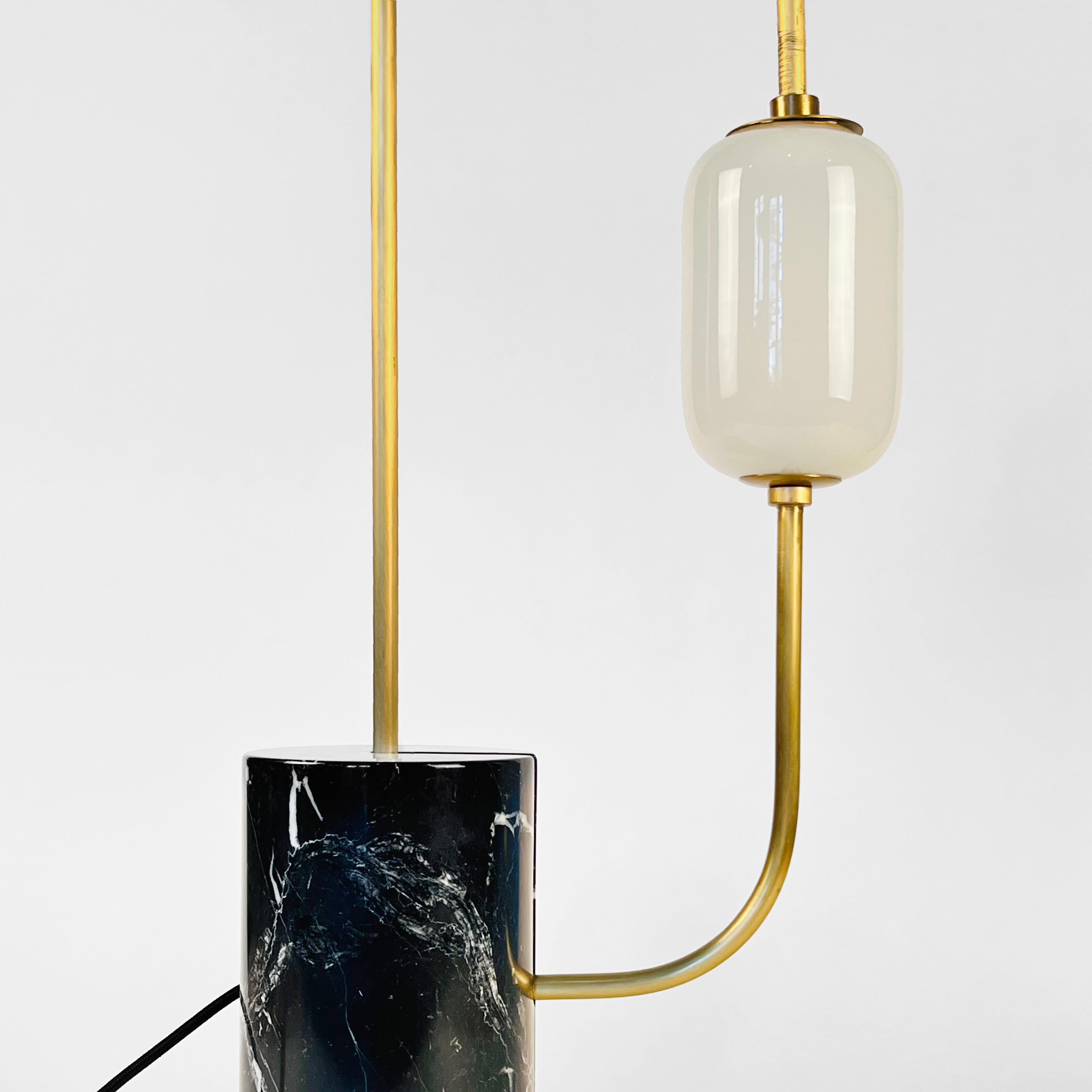 Contemporary Brass Loop Table Lamp with Black Marble Base and White Capsule Shade For Sale
