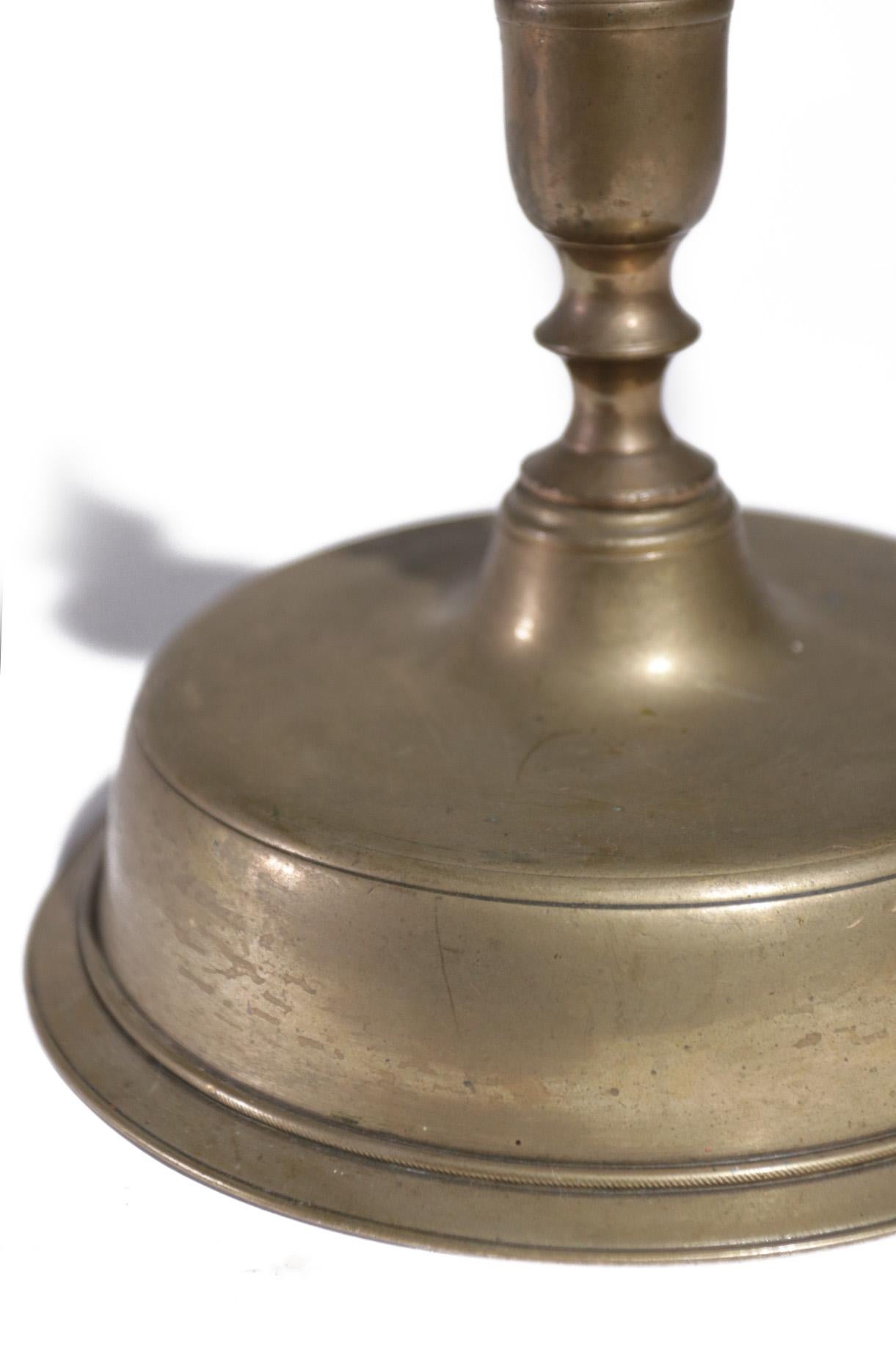 brass bell candle holder