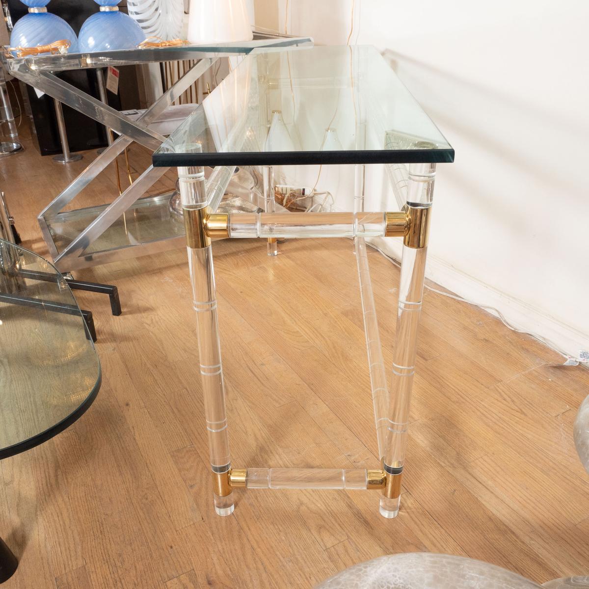 Mid-Century Modern Brass lucite and glass slender console For Sale