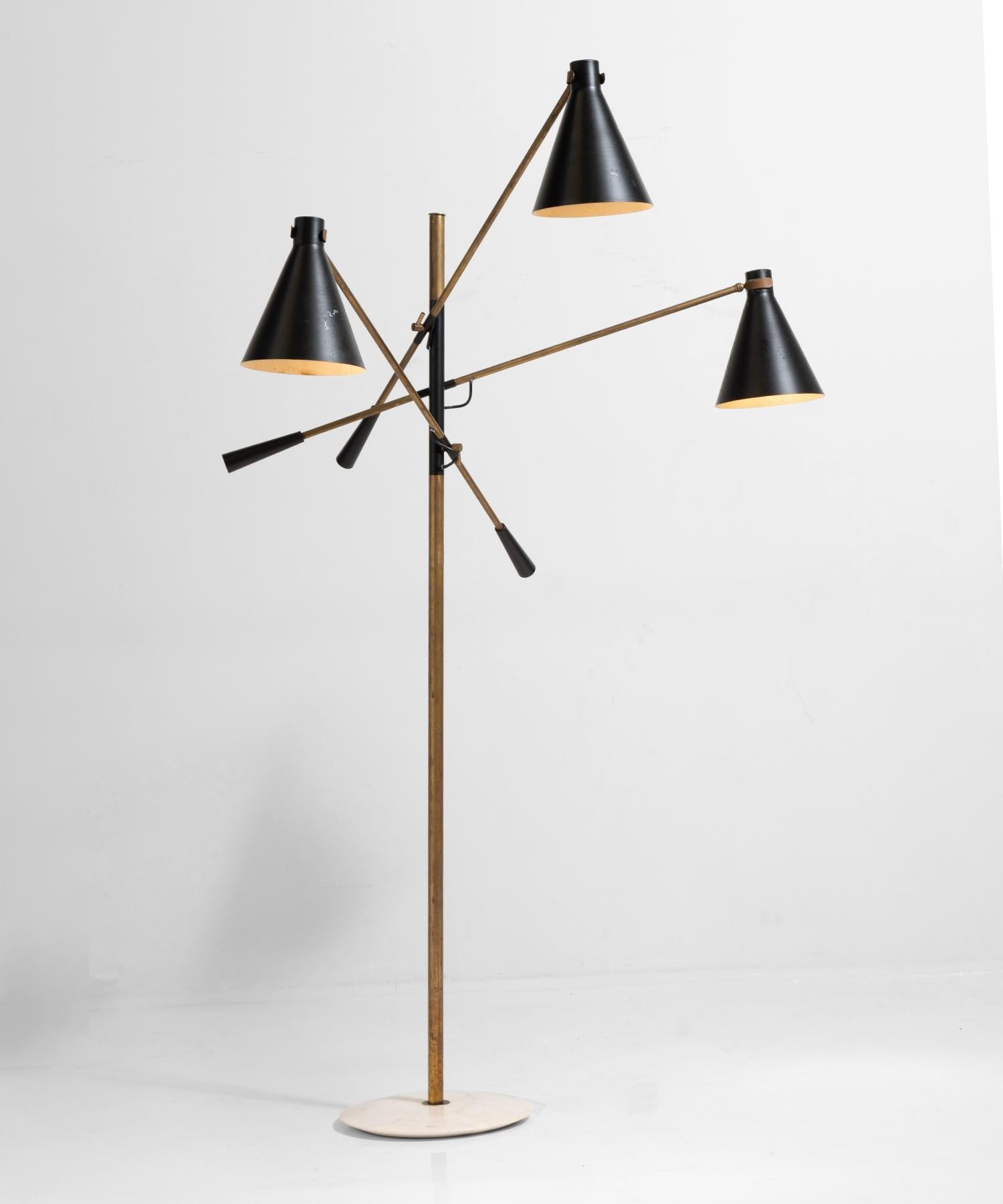 Brass, marble and black enamel floor lamp, Italy, 1960.

Unique adjustable arms with original paint and finish.
               