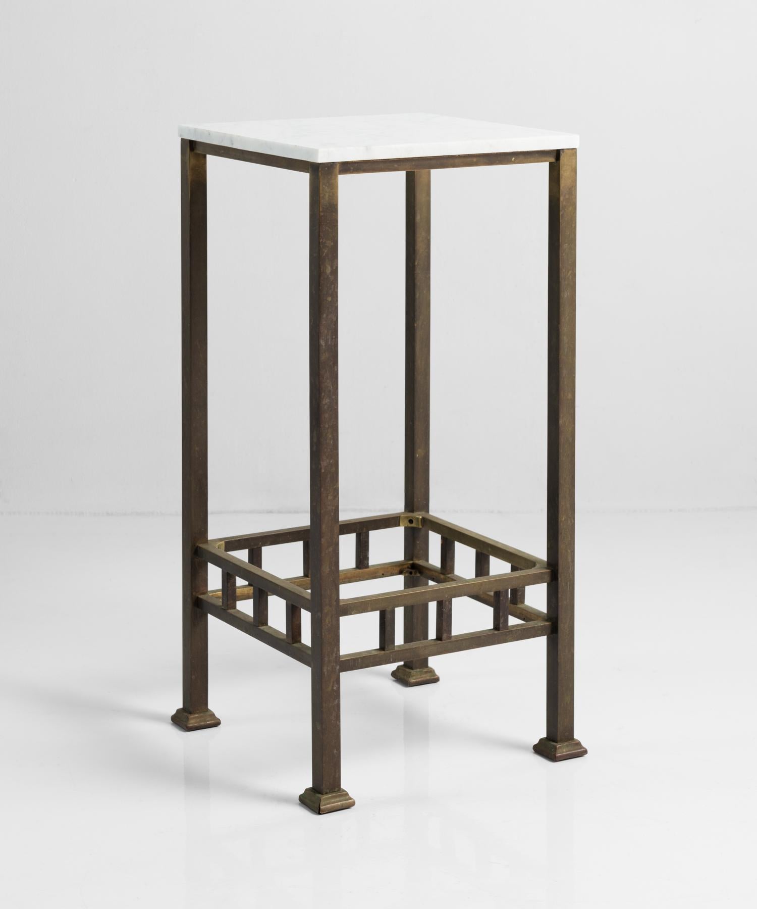 Brass and marble side table, England, circa 1940.

Simple form with brass structure and Carrara marble top.